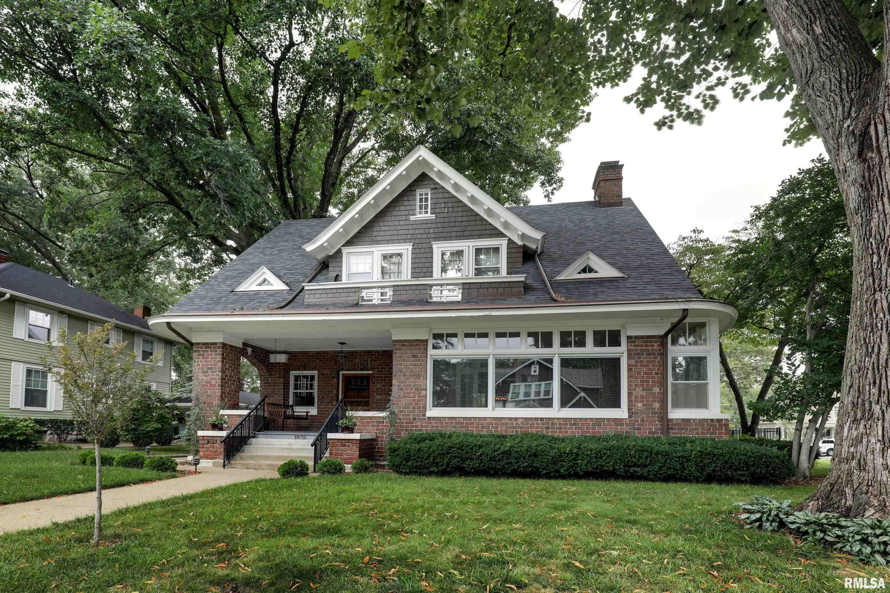Timeless craftsmanship and historic character come together beautifully in this distinctive Grove Avenue home.  From the moment you enter, the exceptional original woodwork and architectural details reflect the quality and craftsmanship of a bygone era.   The current owner thoughtfully selected period-inspired lighting fixtures that will remain with the home.   Offering 5 bedrooms and 4 baths, the home provides an impressive amount of living space.  The updated kitchen features quartz countertops and stainless steel appliances.  The finished upper level creates a private primary suite featuring beautiful built-in closet storage, generous space for a home office or quiet sitting area, and a private bath with a Jacuzzi tub.   Enjoy your mornings in the beautiful four-season room, surrounded by windows overlooking Grove Avenue.   The partially finished basement offers additional space for entertaining and recreation, complete with a beautiful pool table and accessories. Step outside to a partially fenced backyard with a patio and thoughtfully landscaped grounds.   Don't miss this opportunity to own this beautiful home in a sought-after historic neighborhood.   Inspections welcomed. Selling AS-IS