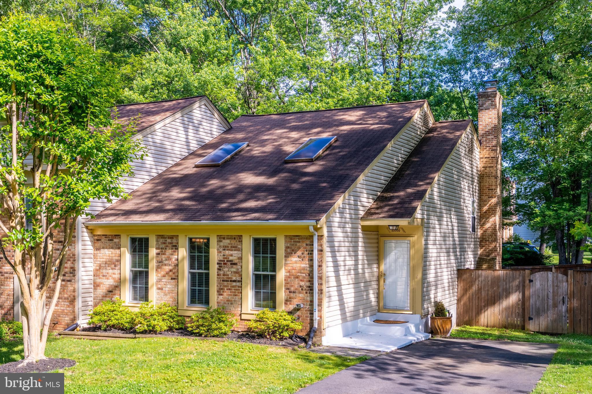 If you've been looking for a home with space to spread out, a great backyard, and a location that makes everyday life easier, this one is worth a look. Located on a quiet no-through street in the Woods of Burke Centre, 10060 Wood Sorrels Lane offers three finished levels, 3 bedrooms, and 3 full bathrooms with a layout that feels both open and practical. The main level is filled with natural light and features vaulted ceilings, recessed lighting, hardwood stairs, and wood flooring upstairs. The kitchen opens directly to the dining and living spaces, making it easy to stay connected whether you're cooking dinner, hosting friends, or keeping an eye on little ones. You'll find 42-inch maple cabinets, granite countertops, stainless steel appliances, and a large center island with plenty of prep and gathering space. Upstairs, the bedrooms are generously sized and offer room to grow, work from home, or accommodate guests comfortably. The walkout lower level adds a huge rec room with built-ins, a wood-burning fireplace, and its own full bathroom, giving you flexibility for a guest space, home office, gym, playroom, or movie room. Outside, the fully fenced backyard backs to a peaceful nature area, creating a private setting that's hard to find. The large deck is perfect for relaxing, grilling, or spending time with friends, and there's still plenty of yard space beyond the deck for pets, gardening, or outdoor games. Major updates have already been taken care of, including HVAC (2022), roof (2015), hot water heater (2017), and replacement windows. Burke Centre is one of Northern Virginia's most loved communities for good reason. Residents enjoy five community pools, clubhouses, tennis and basketball courts, playgrounds, miles of walking and biking trails, and a popular farmers market. The location is convenient to shopping, restaurants, gyms, George Mason University, major commuter routes, the VRE, Metro bus service to the Pentagon, Fort Belvoir, Washington, DC, and multiple airports. The home is also located within the highly regarded Robinson Secondary School pyramid. With a two-car driveway, a private backyard, and access to everything Burke Centre has to offer, this home combines everyday convenience with the space and flexibility many buyers are looking for.