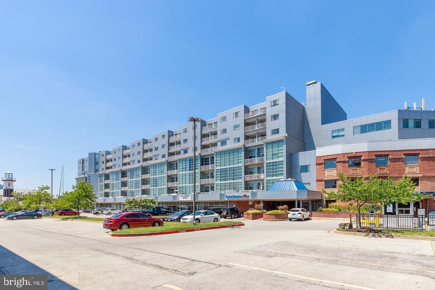 Welcome to Lighthouse Point- one of Canton's premiere water oriented condo coummuties.     Unit 725 is updated  with an open floor plan, spacious bedroom and den   that can be used as a second bedroom .   offering an open floor plan with lots of natural light, ample storage, private balcony and deeded parking.   The buidling has 24 hour security, a fitness center and covenient to  the  promenade  and all Canton lifestyle has to offer    Availalbe  November 1  Pets case by caseGood Credit and income required