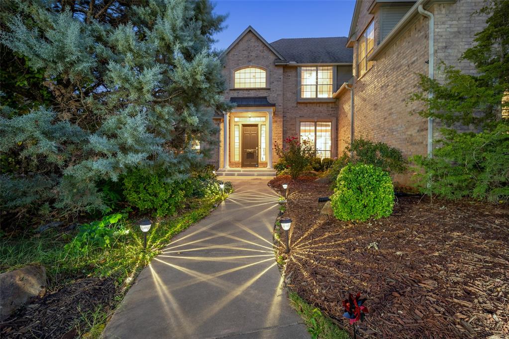 6-7 BLOCKS AWAY FROM OU CAMPUS - 1.14 Scenic Acre in the middle of Norman & STUNNING, HEATED pebble tech pool/spa with waterfall feature. Private Gated entry with circle drive & new water fountain. $200k+ worth of upgrade installed since 2021. Relax aside the pool or on second floor balcony through customized spiral staircase and enjoy an unspoiled view of walking paths and a beautiful Greenbelt view. Relax on the shaded wood deck while the family swims and serve dinner on the large backyard deck. Enjoy walking paths into the adjoining neighborhood featuring a fountain and a pond. Extensive, oak wood flooring in the home and new carpet throughout. Primary suite downstairs with large, bright bathroom and underfloor heating. The upper-level features four bedrooms, each offering unique amenities. One bedroom has access to balcony, with a spiral staircase leading to the pool, making it a perfect guest pool room. One bedroom includes ensuite bath. Other two bedrooms share a jack-and-jill bath, with one room showcasing a generously sized closet. The thoughtfully designed spaces provide comfort and privacy. Large executive-sized study with new wood flooring, a wall of built-ins, and floor-to-ceiling windows for gorgeous views to front yard and crimson-cream brick bridge leading to ou campus. Spacious kitchen with 6 burner cooking center with griddle, a large walk-in pantry and large kitchen island. Main floor has a formal living room and a casual family room, each with a fireplace. Other features include water well for lawn irrigation, a "secret room" that your kids will love. Main upgrades since 2021 include newly installed inground pool/spa, entry gate and three sections of fence, customized spiral staircase, 2 new HVACs, new front yard fountain, new carpet, partial hardwood floor, newly built-in electric fireplace, storm shelter, comprehensive security systems covering all entry points, and termite bond (2024). Top rated McKinley elementary.