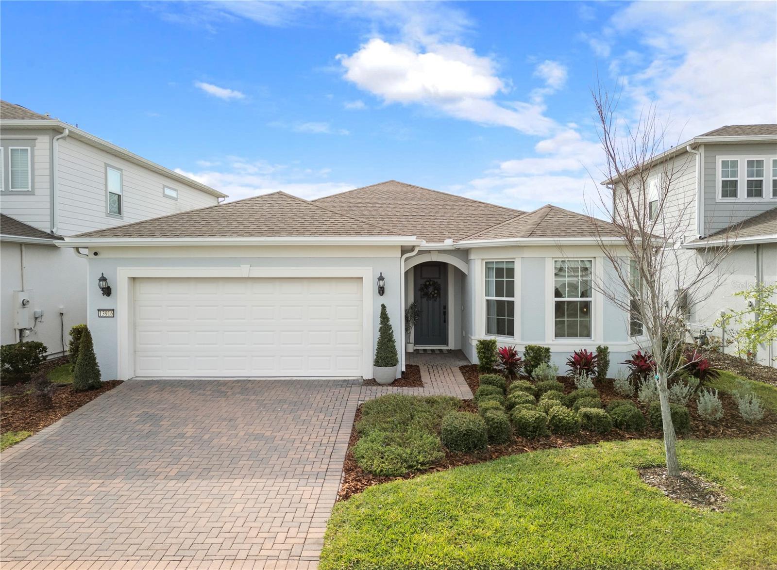Under contract-accepting backup offers. Stunning WATERFRONT Lake Nona Home – Priced WAY Below Appraised Value! Discover the perfect blend of luxury and functionality in this beautifully upgraded Isles of Lake Nona home with serene WATER VIEWS! Inside, enjoy a home designed for modern living with a tastefully designed HGTV-worthy custom kitchen, upgraded dining and kitchen light fixtures, smart roller shades and blinds along with STUNNING top-tier quartz countertops. All while overlooking a LARGE living room with upgraded ceiling height. The primary bedroom boasts a CUSTOM CLOSET, while the laundry room is enhanced with additional cabinetry for extra storage. You also have a FLEX ROOM that in addition to the 3 bedrooms that features a built-in desk with quartz countertops and bookshelves. A thoughtfully designed entryway mudroom, and an epoxy-finished garage with an included refrigerator. Step outside through your POCKET GLASS DOORS to an extended patio, complete with artificial turf (ideal for cornhole!), a GAS FIREPLACE, and motorized screens, creating the ultimate indoor-outdoor retreat that your guests will absolutely love. Additional upgrades include added electrical outlets in storage closets for convenience, and a water softener. This home is truly move-in ready! Don’t miss this incredible opportunity to own a luxury home in Lake Nona at an unbeatable value. Schedule your private showing today!