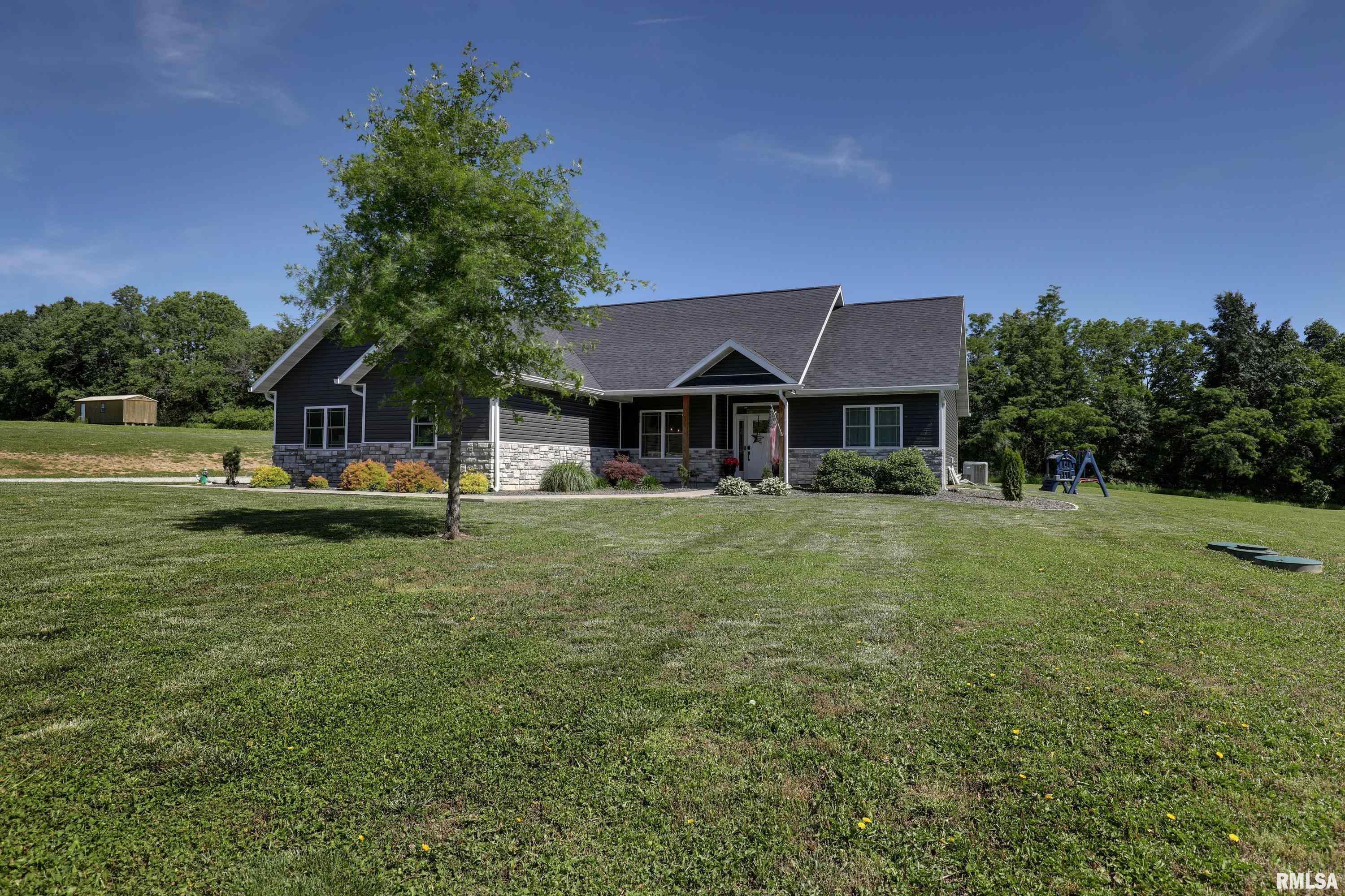 Built in 2021, this beautiful 3-bedroom, 2-bath home offers the perfect combination of modern comfort and country living. Situated on approximately 4 acres, the property provides plenty of space to enjoy the outdoors while remaining just minutes from town.  Inside, you'll find 1,700 square feet of thoughtfully designed living space featuring an open-concept living room, dining area, and kitchen—ideal for everyday living and entertaining. The spacious primary suite includes a large walk-in closet and a private bath complete with both a relaxing soaking tub and a separate walk-in shower for added convenience.  The 25 x 25 attached 2-car garage offers ample room for vehicles, storage, and even a dedicated workspace for hobbies or projects. Outside, the open and highly usable acreage creates endless possibilities, whether you're interested in gardening, outdoor recreation, pets, or simply enjoying the peace and privacy of your own land.  If you've been searching for a newer home with acreage, functional living space, and room to make your own, 56900 Patriot Lane, New London, MO is a property you won't want to miss. Schedule your showing today!