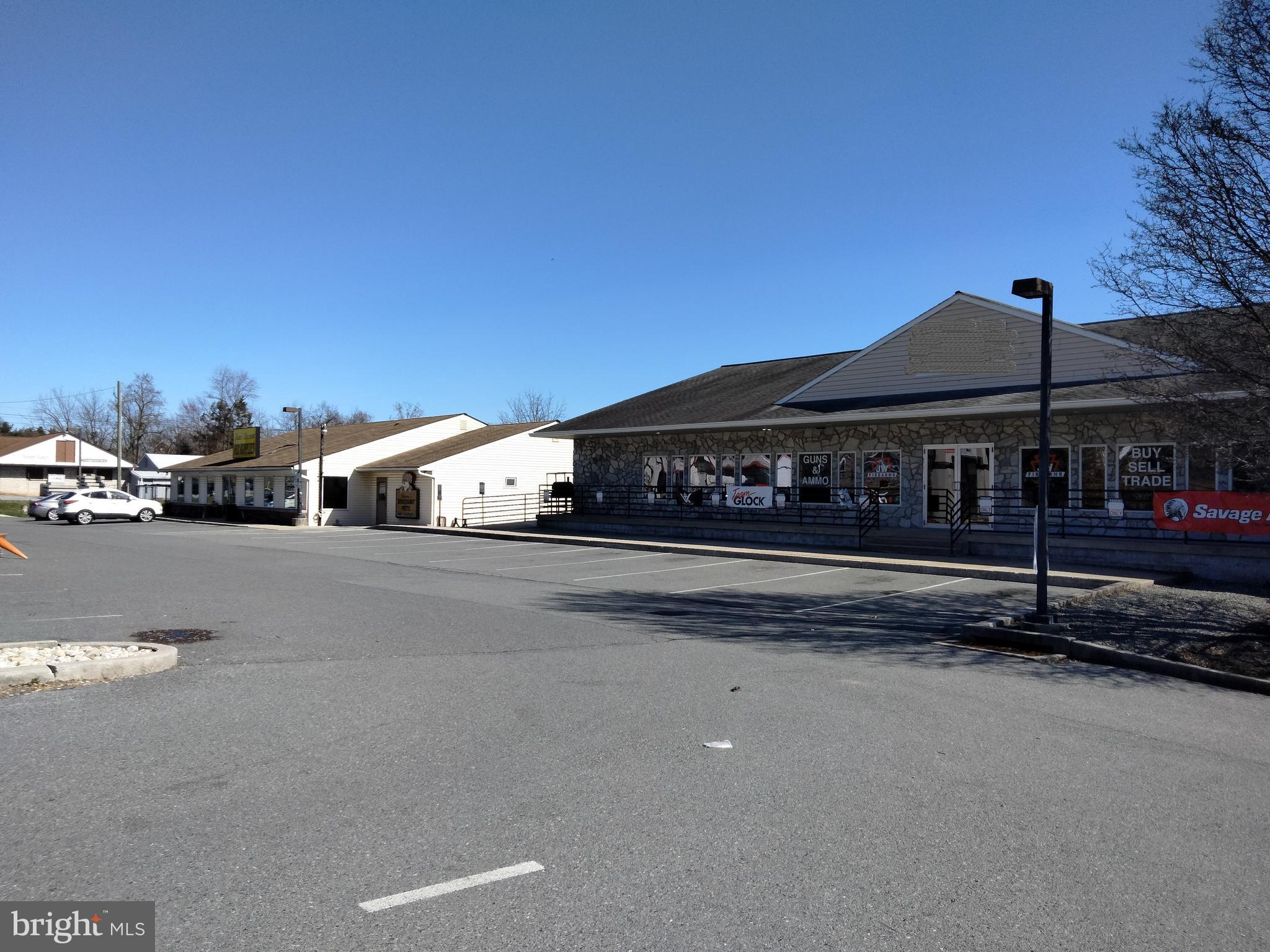 ANOTHER 422 OPPORTUNITY !!! This is a 3 building, 4 space/tenant investment property situated on 3+ acres. Property is 100 % leased. Current NOI is approx $153k+/year. Taxes for '26 at 2% discount are $25415, insurance is $12575 and CAM is $25000. 3 tenants are multi-year terms, 1 tenant prefers renewing year-to-year, and has done so for 15-20 years. Seller specifies sale, "As Is". Rear home on 1.44 acres can also be purchased for additional monies and is also zoned C-1. Total square footage of all leased space is 23,000 and this includes upper and lower levels. Zoning and flyer attached under docs.