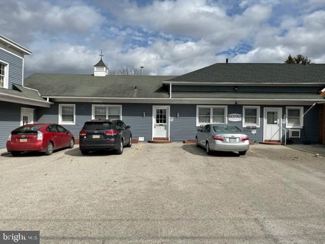 Newly renovated office space.  Owner just replaced blinds, carpet, flooring in the restroom and paint.  Rate includes C.A.M. charges.  Tenants pay electric, gas, data and trash.  This space has 4 offices, 1 half bath and storage area.  Approximately 1000 sq. ft.