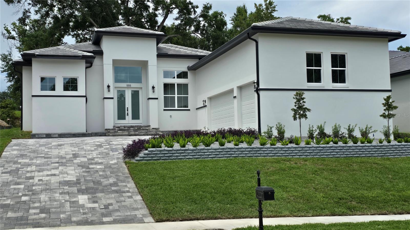 NEW CONSTRUCTION!!!  Located in the exclusive and very private gated community of Sanctuary Golf Estates. This gorgeous, moderm,  and open-concept home has a huge list of upgrades. The list includes a 30 year flat tile roof, paver driveway and steps, high tray ceilings in the common areas and primary bedroom, 7 inch baseboards, a waterfall kitchen island with farmhouse sink, gray shaker cabinets with crown molding, dual ovens with a combo microwave, three-car garage, vented range hood, gutters with underground drainage, wired cat 6 network as well as a dedicated office for those working from home, built in closets, and fully upgraded primary bath. The primary bath has a free standing soaking tub, upgrade ceramic tile floors and shower walls, separate vanities with plenty of cabinet space, Upgraded ceramic tiles throughout the common spaces with plush carpets in the bedrooms.  

Lease to own options available! Don't hesitate to inquire

Own the nicest home in Sanctuary Golf Estates!