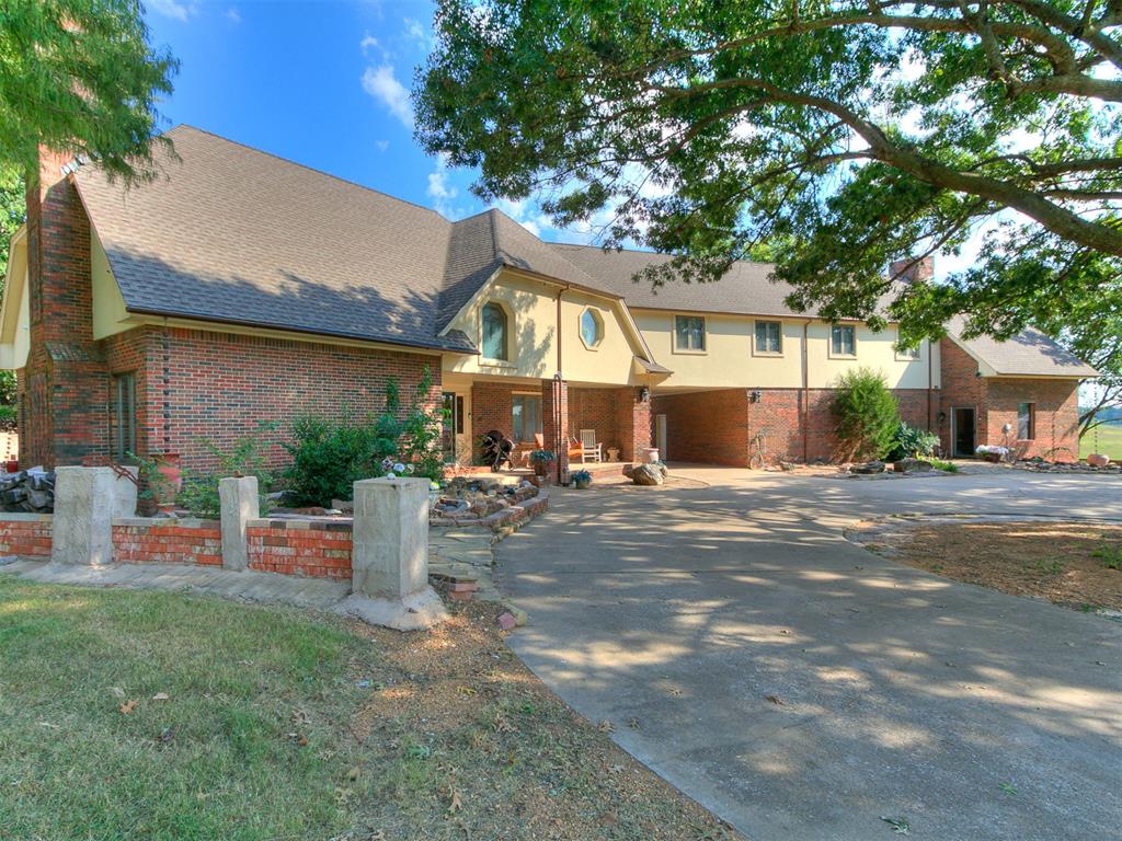 Welcome to 13 Southcliff, an expansive estate in Norman’s sought-after Southcliff community. This property offers a rare combination of space, flexibility, and resort-style amenities — perfect for multi-generational living or those who love to entertain.

Inside the main home, you’ll find over five spacious bedrooms, multiple living areas, and thoughtful details throughout. The large chef’s kitchen is designed for gatherings with its central island, brick backsplash, breakfast nook, and abundant cabinet space. Formal and casual dining areas flow easily into the cozy family room, complete with a fireplace and rich wood accents. Additional highlights include a music room, a dedicated theater for movie nights, and multiple flex spaces that can be used as offices, playrooms, or hobby rooms.

The primary suite is a true retreat, featuring a fireplace, sitting area, and a spa-inspired bath. Secondary bedrooms are generously sized, offering comfort and privacy for every member of the household.

A standout feature is the separate guest apartment, complete with its own private entrance, living room, full kitchen, bedroom, and bath. This setup is ideal for in-laws, college-aged children, guests, or even private rental income.

Step outside to enjoy your own backyard oasis. The grounds feature a sparkling pool, covered patio, expansive deck, koi pond with a charming pergola, and lush landscaping that provides both beauty and privacy.

Additional amenities include a 2-car garage with circle drive, and ample storage throughout.

Just minutes from shopping, dining, and top-rated schools, this Southcliff estate blends privacy, convenience, and lifestyle. Whether you’re hosting family gatherings, working from home, or relaxing by the pool, this home offers the space and flexibility to do it all.