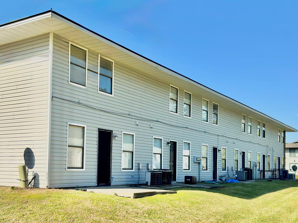 8-unit multifamily opportunity in Valdosta with a clear value-add strategy already underway. Four units are currently leased through 2027, while four units are in the process of being updated - allowing a new owner to complete renovations and push rents to market rates. Each 970 sq ft unit features a 2BR/1.5BA two-story layout with in-unit laundry. Partial updates have been completed in most units, including LVP flooring, fresh paint, updated lighting and stainless appliances. Tenants pay all utilities. Major improvements include a new roof in 2017 and a resurfaced parking lot. Located near Valdosta State University, downtown, and Moody AFB, supporting strong and consistent rental demand. Well-positioned for an investor seeking in-place income with significant rent growth potential. Lowndes County Parcel Number 0117A 173.