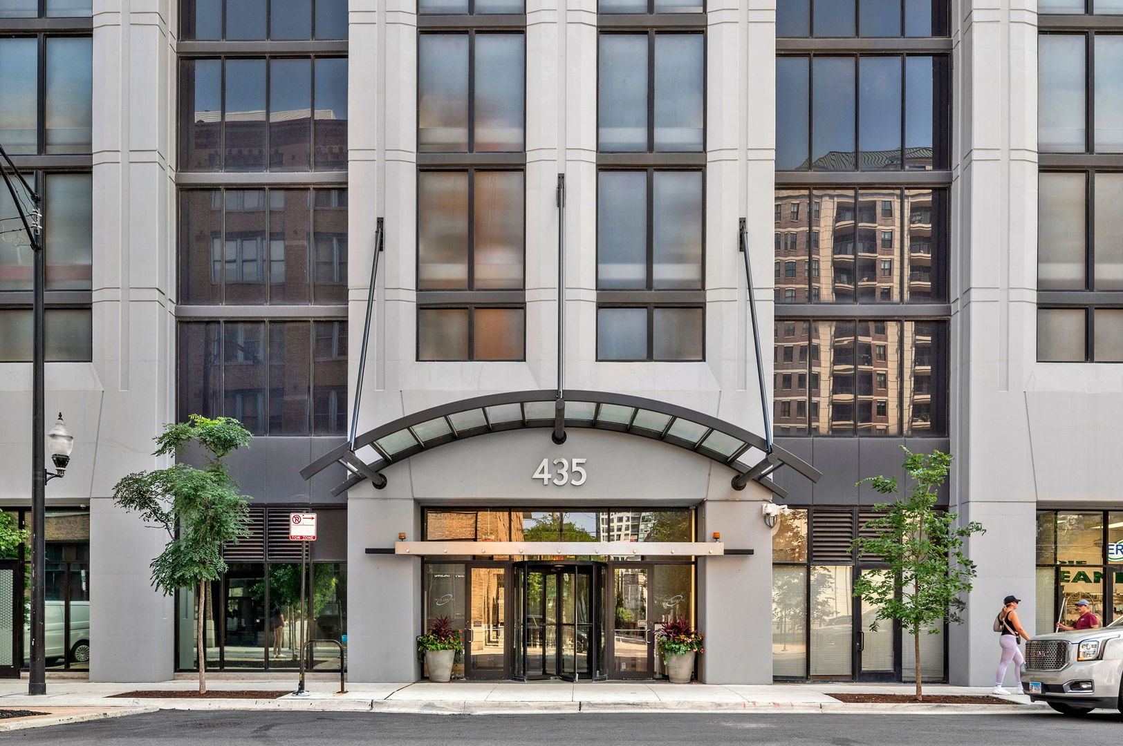 Stunning NE facing 2 bed, 2 bath condo in desirable River North! Open concept floor plan with dining room/ living room combo, cozy gas fireplace with custom mantle, and incredible city views that open out to your private balcony - perfect for entertaining! Chef's inspired Kitchen features white cabinetry with black hardware, striking white quartz countertops, subway tile backsplash, and stainless steel appliances. Spacious primary bedroom features breathtaking city views, floor to ceiling windows, and ample closet space. Spa like en-suite bath features, custom dual vanity, glass steam shower & soaking tub. Gleaming engineered hardwood floors throughout. In-unit laundry. Building amenities include a fitness center, party room, and roof deck. This home is steps from CTA stops, East Bank Club, dog parks, restaurants, coffee shops & the nightlife River North has to offer. 1 garage parking space for an additional $35K!