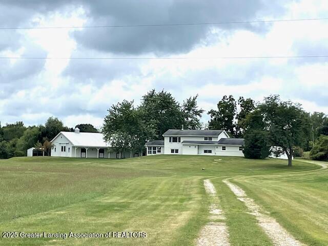 This amazingly rare property is a 30 acre paradise. There is a 4 bed, 2 bath, 2,000+ sq ft home, a 2,128 sq ft horse barn, a spring-fed pond, and a stream you can cross to the wooded area. The home is a raised ranch with views of the surrounding property. The main floor has a living room, eat-in kitchen, 2 bedrooms, and a full bath. On the lower level are an additional 2 bedrooms, full bath, large family room, and sliders to the 3 season rooms, plus a utility room. The barn has 4 stalls each with fans, feed access and outside exit split Dutch doors. There are two stations, one wash down and one to groom your horses, a good sized tack room plus an expansive shop area with outside access and a place for hay storage. No expense has been spared with the construction and design of this barn! Could be used for just about any kind of business or livestock. There are 3 additional outbuildings on the property. There is a barn cat that would like to stay on the property, if possible. Sale of ho