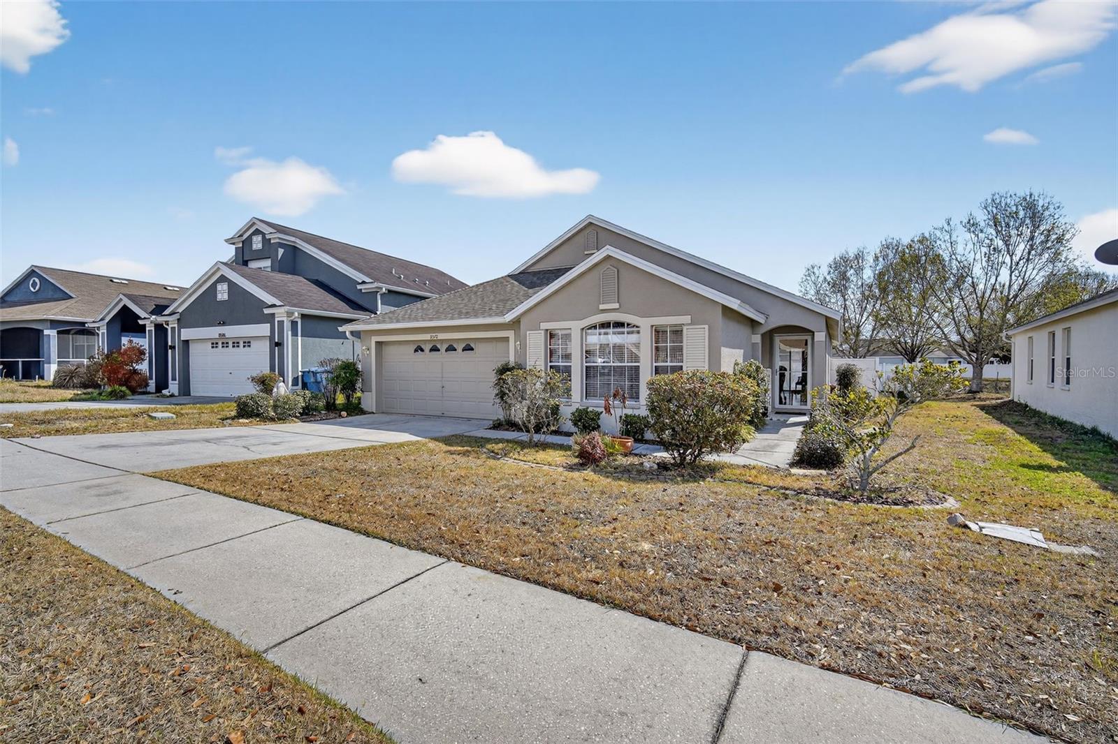 Beautifully maintained and move-in ready, this 3 bedroom, 2 bath, 2-car garage home is tucked inside the desirable gated community of Spring Ridge, offering both comfort and convenience in the heart of Brooksville. ROOF 12/2025; HVAC 7/2024; EXTERIOR PAINT 2024;Step inside to a bright, open layout with a versatile living/dining room combination plus a cozy family room, giving you flexible space for everyday living and entertaining. The kitchen features ample cabinet and counter space, a breakfast bar, and pantry, making meal prep and casual dining a breeze.The private primary suite includes a walk-in closet and a spacious ensuite bath with dual sinks, relaxing garden tub, and separate shower. Two additional bedrooms and a full guest bath are thoughtfully positioned for family or overnight guests. Enjoy Florida living on the covered back patio overlooking the fenced backyard, an ideal spot for pets, play, or weekend cookouts.Spring Ridge is a deed-restricted community offering resort-style amenities, including a clubhouse, community pool, fitness center, and basketball court, plus sidewalks for evening strolls. All of this is just minutes from local shopping, dining, schools, and major roadways for an easy commute throughout Hernando County and the greater Tampa Bay area. Come see why this inviting home in Spring Ridge should be your next address.
