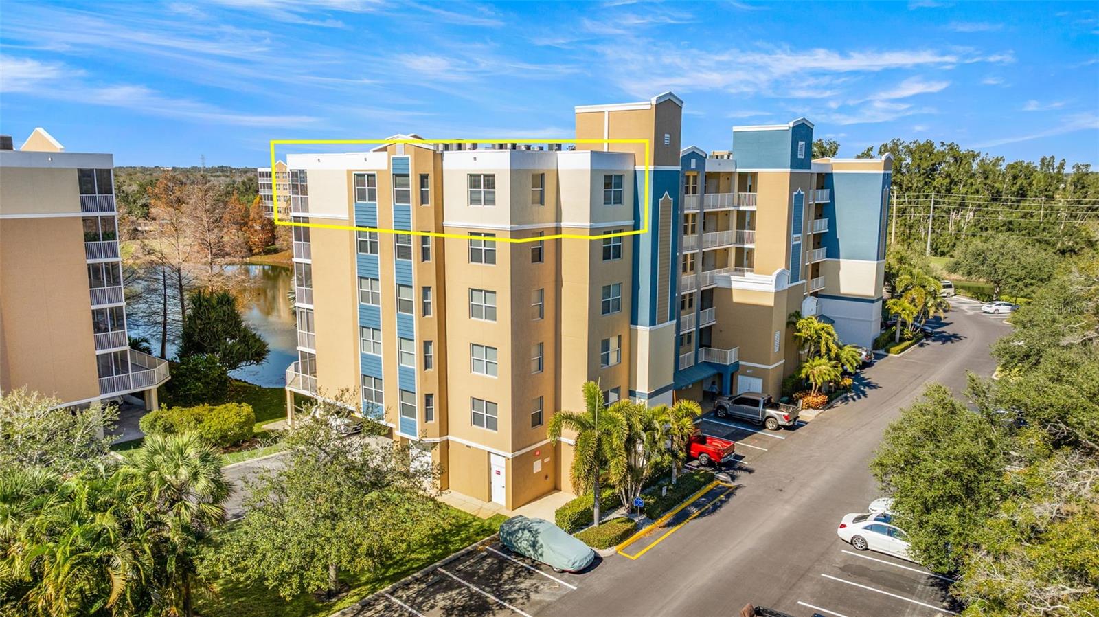 Welcome to Golf Lake Condo #2501, a beautifully maintained penthouse corner residence in one of Largo’s most solidly constructed concrete condominium buildings, located in a non-flood zone. This elevated home offers peace of mind with secure construction, a quiet resort-style setting, and the first required Milestone Inspection still years away. With strong HOA management, well-funded reserves, and consistent professional oversight, Golf Lake Condos are truly a hidden gem and a compelling investment opportunity. This 3-bedroom, 2-bath residence offers exceptional privacy and tranquility, surrounded by lake, treetop, and nature views. Nearly every room features windows, filling the home with natural light on three sides. The spacious split floor plan provides approximately 1,836 square feet of living space (nearly 2,000 total including the lanai), with soaring ceilings just under 9 feet. The kitchen and dining area flow seamlessly into the living room, with sliding glass doors leading to a large screened corner lanai—perfect for morning coffee or evening relaxation. The primary suite is a true retreat, offering direct lanai access, his-and-hers walk-in closets, and an ensuite bath with dual vanities, a garden tub, walk-in shower, and private water closet. The guest wing includes two additional bedrooms, a full bath, laundry area with storage, and multiple closets. A secure elevator takes you directly to your oversized under-building private garage (16’ x 20’), offering easy access and room for a full size vehicle plus golf cart. The community is meticulously maintained and set within a park-like natural environment rich with wildlife. Amenities include two swimming pools (one heated), a hot tub, and a resort-style clubhouse with full kitchen, lounge, and meeting room. Enjoy a country club atmosphere next to East Bay Golf Club, open to the public with no membership required. HOA fees include water, sewer, trash, cable TV, high-speed internet, building insurance, and maintenance of all common areas. Fire sprinklers and updated safety features add to the sense of security. Ideally located near dining, shopping, entertainment, medical facilities, and just 15 minutes from the Gulf beaches, with easy access to Clearwater, St. Petersburg, Tampa, and area airports. Whether you’re seeking a peaceful full-time residence or a low-risk, lock-and-leave lifestyle, Penthouse #2501 at Golf Lake truly has it all.