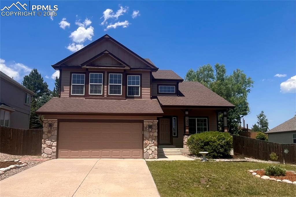 Beautiful, Totally Updated, Home in the Heights at Springs Ranch!  Enjoy this hidden gem that is close to Powers Blvd with easy access to all the major roads to get you anywhere in town in minutes, close to shopping, dining & entertainment & the neighbors show pride of ownership with beautiful, well manicured front yards!  A welcoming front porch is where your tour begins - step into a tile entry with convenient coat closet & fresh paint throughout. New, neutral carpet & luxury vinyl is all through the home with ceramic tile in a few key areas.  Vaulted ceilings are in the main level living room & primary suite. Ceiling fans, new light fixtures & window coverings are scattered throughout the home & wide baseboards add a designers touch! The large, eat-in kitchen has stainless steel appliances, fridge with icemaker, 5 burner glass top stove, TONS of counter space, a pantry for storing all of your goodies, a sliding door to the back yard & is open to the family room. The family room has a built-in gas fireplace with beautiful accent tiles, LOTS of built-in storage for electronic components & other treasures & a unique cedar plank feature wall. The washer & dryer are included in the main level laundry & you have a nice 1/2 bath on the main level too. Upstairs you'll find the primary bedroom with it's own ensuite bathroom, 2 generous bedrooms, a hall bathroom, a linen closet & an open loft area you could use as an office, playroom, TV room or just a bright spot to relax.  The primary bedroom is spacious & the private bathroom has beautiful tile flooring, double vanities, a HUGE walk-in closet, separate soaking tub, a glass enclosed shower & separate toilet area.  The finished basement has a HUGE family room with wet bar area, counter & cabinet space with room for a bar fridge, a large full bathroom, a comfy 4th bedroom, a fun, little play area under the stairs & TONS of storage! Step out to your relaxing back yard with refreshed landscape & large patio. Welcome Home!