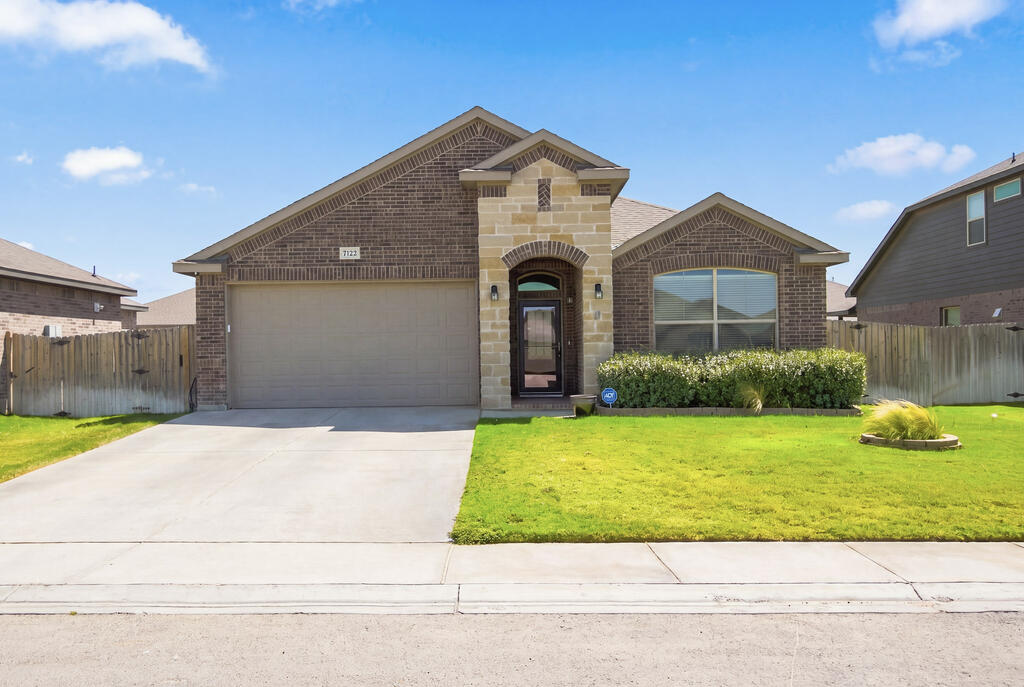 Absolutely gorgeous 4-bedroom, 2-bath home in a prime location! Better than new with beautiful upgrades including a new front storm door, fireplace, custom Levolor blinds, and luxury vinyl plank flooring. The open floor plan features a drop-off station, barn door, and stunning kitchen with oversized island and walk-in pantry. The sequestered primary suite offers a spacious bedroom and huge closet. Enjoy the landscaped backyard, storage shed, extended patio, and access to two neighborhood pools! A must-see!
