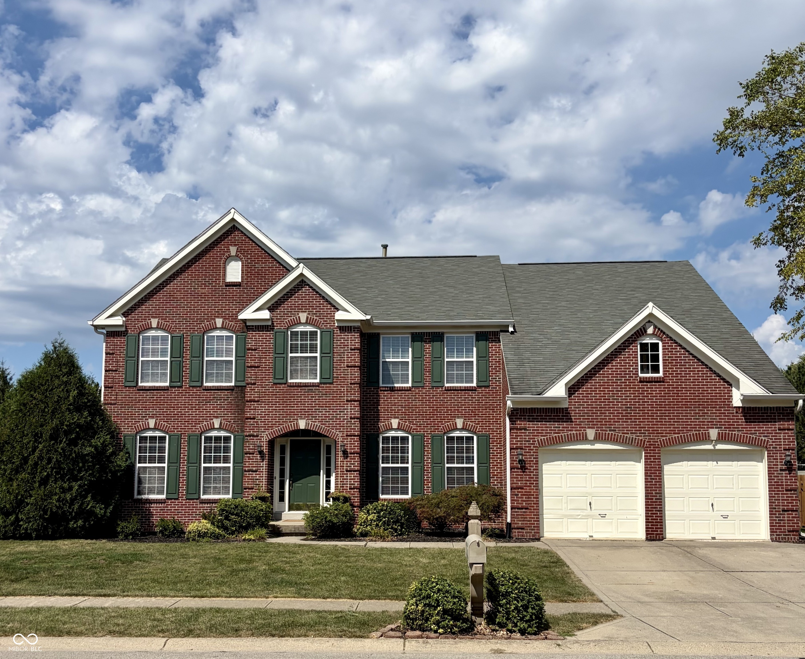 Timeless brick elegance meets impressive, modern living in this exceptional Fishers home. One of the most popular floorplans, the Ashville by Zaring/Drees boasts 5 bedrooms, 4.5 baths, a completely renovated kitchen, 1st floor office, finished basement, loft, & an unforgettable two-story great room w/soaring ceilings, fireplace & a dramatic catwalk overlook! This home was designed to make an impression! Step inside to gorgeous hardwood floors & brand new carpet on the main & 2nd level. The spacious entry greets you with a dramatic staircase & a formal living & dining space that leads into a striking two-story great room featuring hardwood floors, soaring ceilings & an overlook catwalk, creating an impressive focal point & an abundance of natural light. The renovated chefs kitchen offers a stylish & functional gathering space with an eat-at island, SS appliances & adjoining breakfast room, while the main floor office provides the perfect work-from-home retreat. Upstairs, a versatile loft offers additional space for a reading area, playroom, homework zone, or second living space. The primary suite has stunning vaulted ceilings & an updated en-suite w/tub, huge shower & 2 walk-in closets. The finished basement adds even more living & entertaining space featuring a bedroom & full bath. The rest of the living space can easily adapt to your lifestyle-whether you envision a media room, recreation area, home gym, or gathering space - & there's plenty of storage space. Outside, the front full-brick exterior with a brick wrap creates exceptional curb appeal. The private backyard has an expansive concrete patio for grilling & entertaining. Thoughtfully designed, beautifully updated, & filled with flexible living spaces, this Fishers home offers the perfect blend of character, comfort, & functionality. With shopping, dining & award-winning school's just minutes away, come see the space, style, & architectural details that make this home truly special!