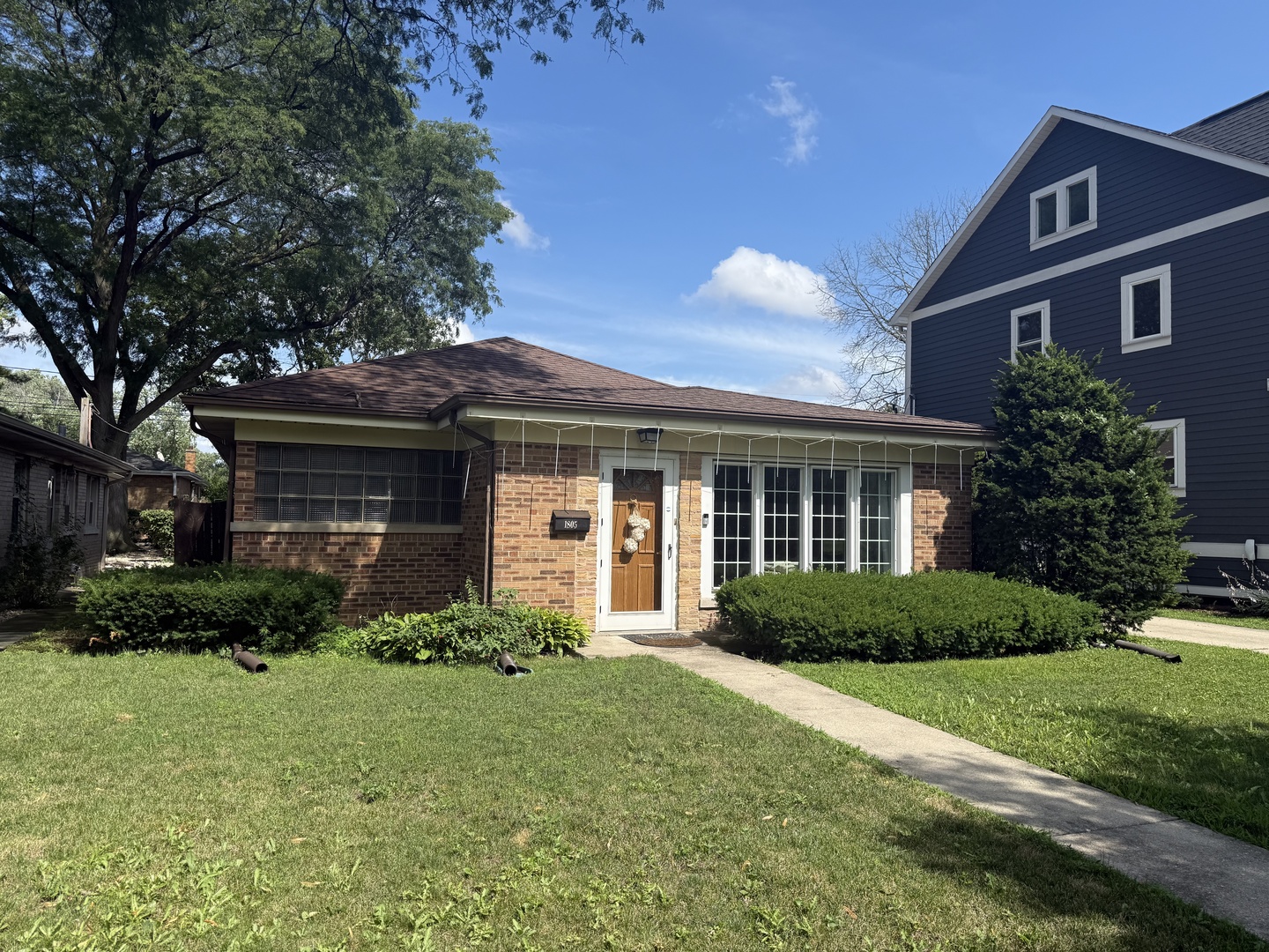 Amazing brick home: this property features a totally remodeled and gorgeous kitchen (2025), and also a remodeled bathroom. Huge living room and the kitchen have new hardwood floors. 3 jumbo sized bedrooms / carpet flooring. Amazing yard with driveway leads to a 2 car garage. The large backyard is perfect for relaxing & gardening - it is fenced for your privacy. Fantastic location near top-rated schools, beautiful parks, and great amenities. Convenient commuter access.