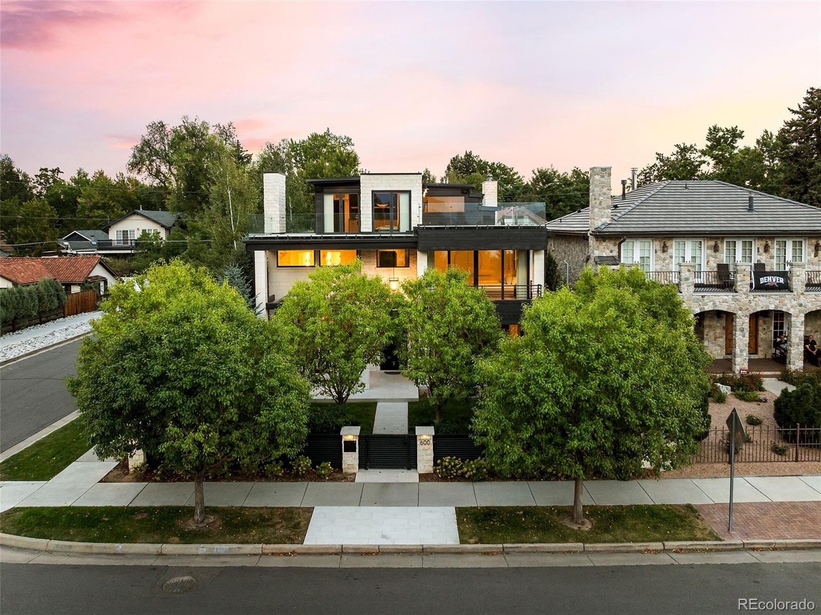 A NEW LOOK. A NEW PRICE. AN EXTRAORDINARY OPPORTUNITY IN WASH PARK.Reintroduced to the market with a fresh new look and compelling new price, this exceptional residence has just completed a total renovation by award-winning Boss Architecture—offering a rare opportunity to own one of Washington Park’s most remarkable homes.Wake each morning to unobstructed, cinematic views stretching across Smith Lake at Washington Park to the Rocky Mountains beyond. Perfectly positioned to capture some of the finest vantage points in Wash Park, the home offers breathtaking views from all three levels.Thoughtfully reimagined from the ground up, the residence has undergone a complete interior and exterior transformation by Boss Architecture, where impeccable craftsmanship meets refined, timeless design. No detail has been overlooked. Designer lighting, top-of-the-line appliances, a private elevator, attached three-car garage, and a Bravas smart home system utilizing Control4—fully customizable and paired with a state-of-the-art security system—create an exceptional living experience.The outdoor spaces are equally compelling. A beautifully landscaped backyard features a saltwater pool, fountain, and outdoor grill, creating an inviting setting for both intimate evenings and elegant entertaining. Above it all, a spectacular rooftop oasis provides an unforgettable retreat for sunset gatherings, framed by sweeping lake and mountain views.Freshly reintroduced and newly priced, this is a rare opportunity to experience an irreplaceable residence in one of Denver’s most coveted settings.