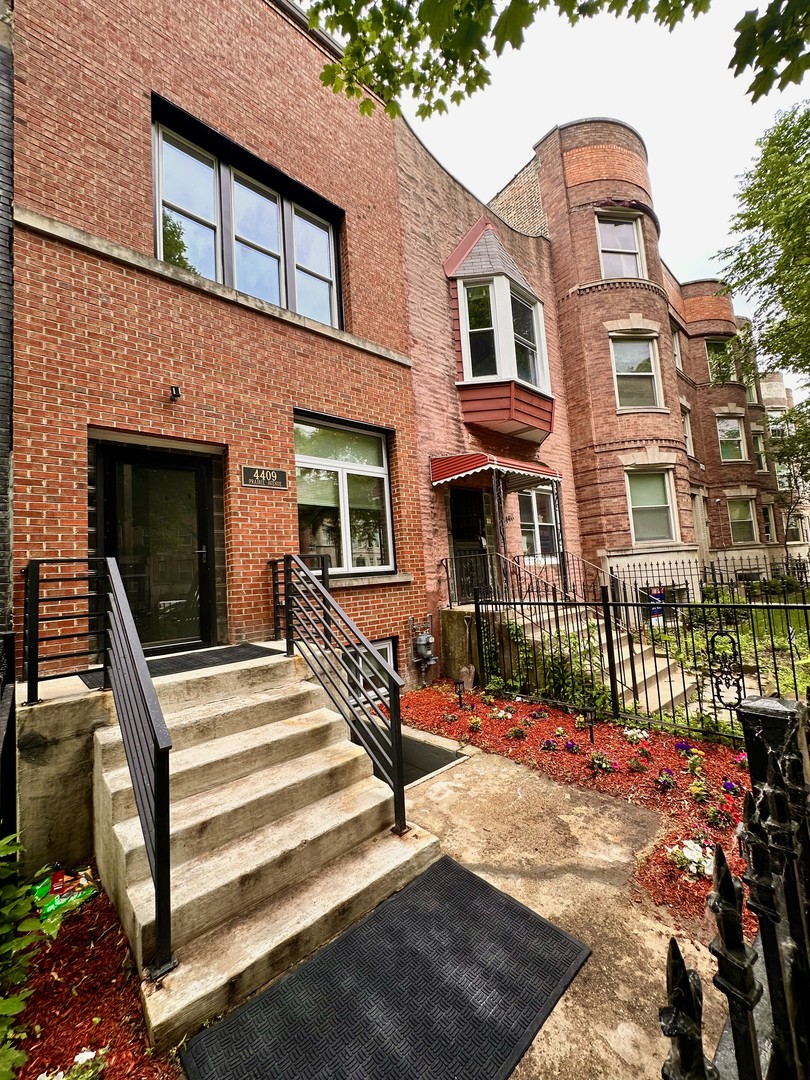 Nestled on the historic and extra-wide Prairie Avenue, this stunning 4-bedroom, 3.5-bath residence offers a thoughtfully designed layout that perfectly blends comfort, style, and versatility. The expansive second level features three generously sized bedrooms, including a serene primary suite, along with a dedicated laundry room for added convenience. The sun-drenched main floor is made for entertaining, showcasing two distinct living areas, a formal dining space, and a chef-inspired custom made kitchen complete with an oversized island, quartz countertops, premium appliances, and a chic powder room. The fully finished garden level provides an ideal in-law suite or potential income-producing rental, featuring its own private entrance (front and rear), a full kitchen, living area, bedroom, bath, and laundry hookup. Designed with year-round comfort in mind, the home features dual HVAC systems and two central AC units-ensuring efficient climate control across all three levels.Updated plumbing, electric and HVAC, all new windows throughout and sound proof windows in the rear of the house! Custom made kitchen with soft closing cabinets! Take advantage of its unbeatable location- few minutes to the lakefront, Bronzeville's dynamic dining and cultural scene, and convenient public transit options. This is a rare opportunity to own a move-in ready home in one of Chicago's most vibrant and historic neighborhoods. Schedule your private tour today!