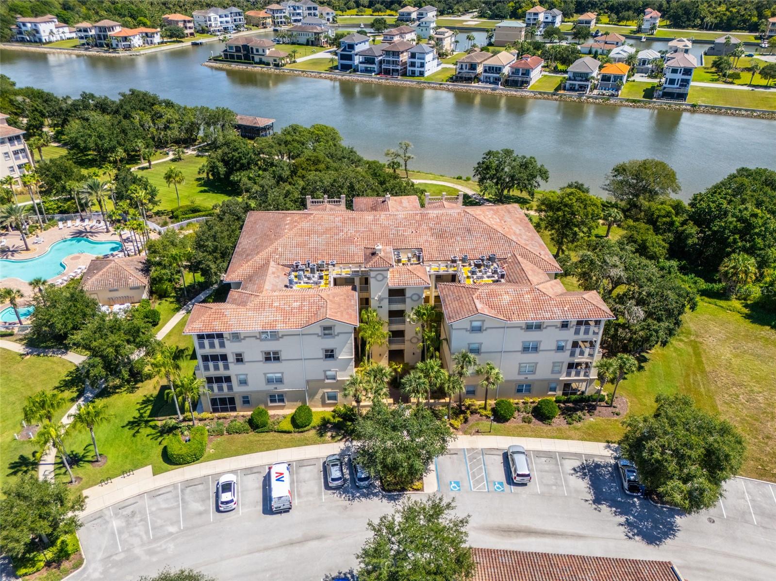 Under contract-accepting backup offers. Welcome to coastal resort-style living! Being Sold FULLY TURNKEY, Unit 2123 is an immaculate 2nd-floor, 3-bedroom, 2-bathroom residence offering peaceful water views and timeless charm. Step inside to find elegant plantation shutters and an upgraded kitchen featuring KitchenAid stainless steel appliances, including a newer 2023 refrigerator. Major updates include a NEW 2024 water heater, brand-new COMFORT HEIGHT toilets, and a full-size washer and dryer. Outside, feel the cool water breezes on your private screened patio, framed by tranquil waters and century-old oaks where local birds nest and playful squirrels keep you endlessly entertainedBONUS FEATURE: DETACHED ONE CAR GARAGE (#2123)Nestled within a premier gated Intracoastal Waterway (ICW) community with NO recreation or master association fees, Enjoy THESE FABULOUS AMENITIES:•WATERFRONT LIVING: Miles of scenic ICW walking paths, a fishing pier, and an observation deck complete with seating for popular community Friday Wine Nights.•ACTIVE LIFESTYLE: 2 swimming pools (one heated year-round), tennis and pickleball courts, a fitness center, game room, and a clubhouse.•UNBEATABLE VALUE: The $800/month HOA fee covers high-speed internet, Wi-Fi, and an expanded cable package with premium streaming (Hulu, Paramount, HBO Max).•PET FRIENDLY: Welcomes up to 2 pets with NO weight or size restrictions!