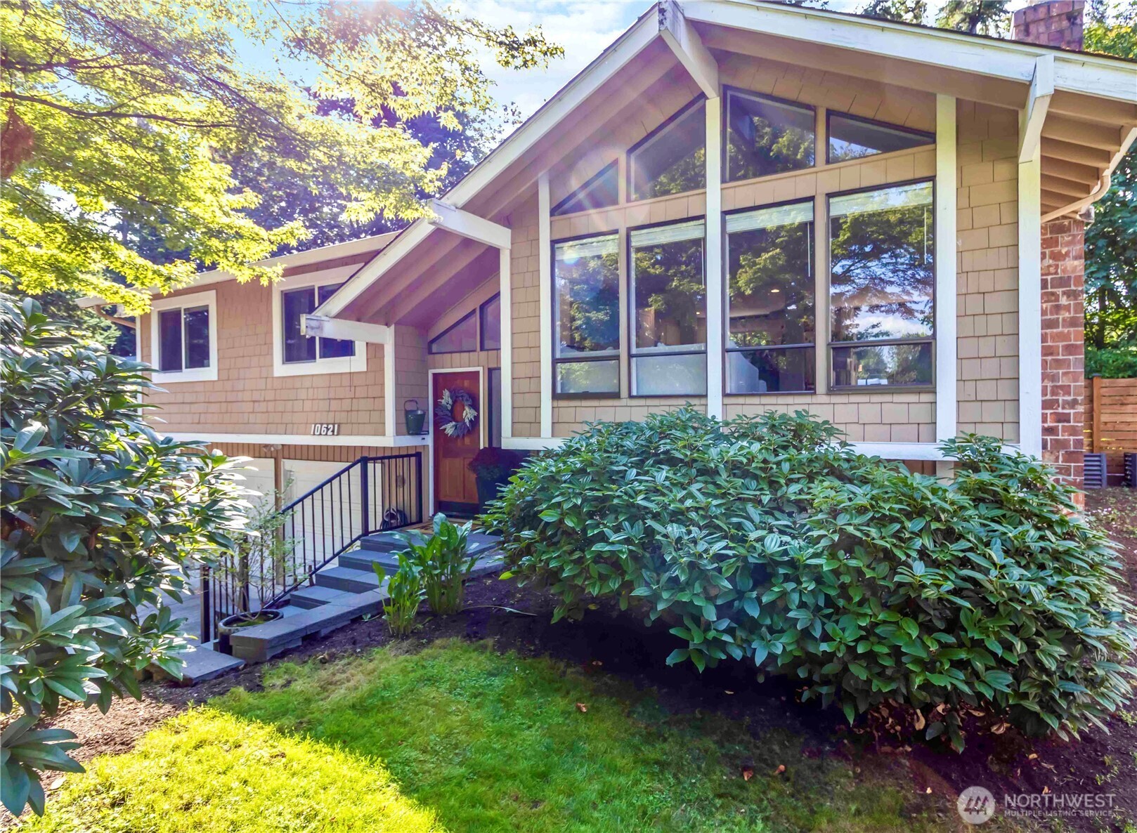 Beautifully updated home in a sought-after Northshore SD neighborhood! Soaring ceilings, bamboo hardwoods, and new recessed lighting create bright, inviting spaces. Renovated kitchen, living areas, and luxurious primary suite offer modern comfort. Enjoy two fireplaces, a finished basement with wet bar, and an entertainment-sized TimberTek deck. The fully fenced backyard features artificial turf, patio, and hot tub—perfect for year-round enjoyment. Landscaped front and back in 2022. Two-car garage and excellent location complete this stunning home.