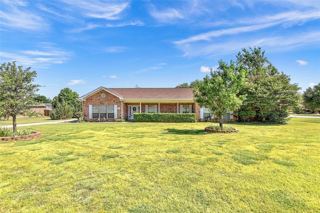 Exceptionally maintained, metal studded, 4 bed, 2 bath, brick home in the quiet neighborhood of Red Bud Estates. Zoned in the highly desired Prosper ISD and right off of Hwy 380. Just a few minutes from shopping with so much more growth to come to the area. This home has so much to offer! A spacious primary room with updated walk-in shower, separate formal dining room and a large walk-in pantry. You can swim in the privacy of your own back yard in the above-ground pool or hot tub. In addition to this beautiful home the owner built an amazing 2 story 30x50 red iron workshop with 1500sqft on each level surrounded by brick veneer to match the house. There is copious amounts of room to store an RV, boat or large machinery. The perfect balance of work and fun all in one with the convenience of your very own property!