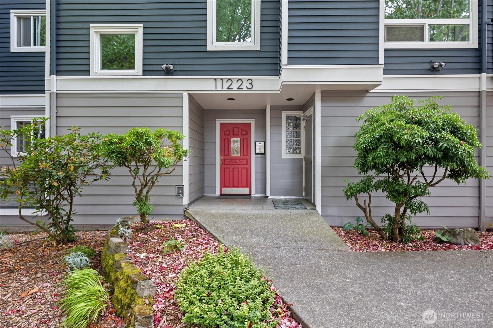 Discover the perfect blend of comfort, style, and convenience in this beautifully renovated condo, filled with natural light and thoughtfully designed for spacious living. Ideally located in a highly walkable neighborhood, you’ll enjoy easy access to shops, restaurants, Northgate Mall, & the light rail station, all just minutes from your doorstep. The inviting open-concept floor plan seamlessly connects the kitchen, dining, and living areas, creating an ideal space for everyday living and entertaining while vaulted ceilings and skylights provide natural light rare to find in a condo. Additional highlights include an in-unit washer and dryer, new carpet, stylishly updated kitchen, custom millwork and fireplace surround,  ample storage, secure lobby access, and additional storage in the secure garage.The exterior has been extensively remodeled with new siding, windows, decks, railings, outdoor lighting, A/C ports, and more, offering a fresh and modern look from the outside in.Enjoy added flexibility and peace of mind with a pet-friendly community, no rental cap, and no special assessments. With its extensive updates, and great location, this condo is ready to welcome you home.