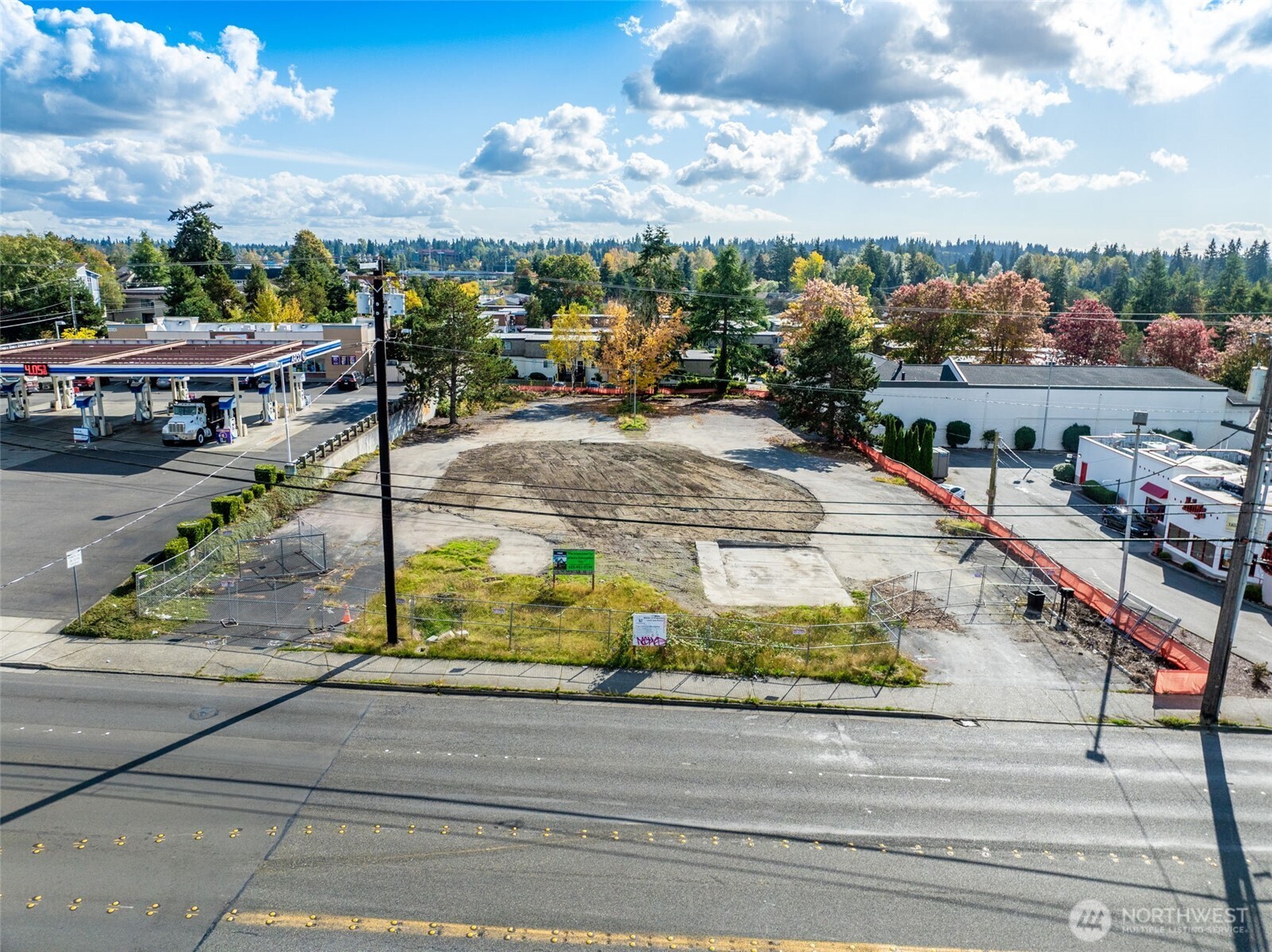 Vacant Land (0.91 Acres) on 196th St - Transit Oriented Development, Former Alfy's Pizza. Mostly level and cleared and blocks from Light Rail Station (0.3 miles). Located within Opportunity Zone allowing deferred-reduced-excluded gains taxes and eligible for Heritage Community Development Loan ($15MM). Recently upzoned to PCD (Planned Commercial Development), allowing residential mixed use. No height or parking requirements. Ideal for 5/2 podium construction with ground level retail. City to complete new zoning & design standards by May 2025. Property is priced for developer terms. Will negotiate for quicker closing.