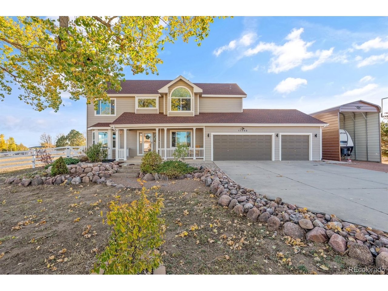 Set on just over an acre in Woodmen Hills, this beautifully updated six-bedroom home offers generous living spaces, Pikes Peak views and Colorado living without an HOA! Large, established trees frame the quiet cul-de-sac setting, while the covered front porch invites you to relax. Enjoy the freedom of over an acre, with room to roam, garden and embrace a little farmstead living! The fully fenced backyard features a new five-foot vinyl fence with four gates, vehicle access, covered pergola and spacious patio. A dedicated chicken pen and shed offer space to raise chickens and enjoy fresh eggs from your own backyard! A private path through the backyard leads to a gated entrance with direct access to one of two community centers, featuring fitness facilities, a seasonal pool, park and event space. Inside, rich hardwood floors, fresh interior paint throughout, freshly shampooed carpets and a soaring two-story great room with gas fireplace create an inviting gathering space. The kitchen features granite counters, center island, stainless appliances, gas range, convection oven and built-in desk, with formal dining nearby. Motorized blinds and surround sound wiring add convenience, while French doors distinguish the main-level office. Upstairs, four bedrooms include a spacious primary suite with a walk-in closet, bay-window seating and updated bath with dual vanities, quartz counters and oversized shower with dual showerheads. Updated LVP flooring enhances the upstairs bathrooms. The finished basement adds two more bedrooms, a full bath and generous recreation room for guests. Additional highlights include a whole-home water filtration system, newer central AC, three-car garage, oversized driveway, separate RV carport and fully paid-off solar system! Convenient to shopping and dining in the growing Falcon area and military installations, this property offers room to spread out, opportunity for hobbies and a wonderful connection to Colorado's outdoors.