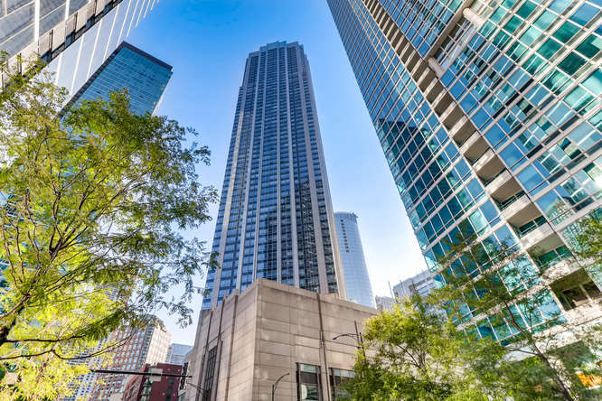 Stunning panoramic views of Lake Michigan and the City abound in this 45th floor corner unit! North, East and West exposures flood the unit with natural light. Well laid out and spacious living/dining room provide for a flexible living area open to the kitchen equipped with new stainless steel appliances and large enough island to comfortably accommodate seating. Large primary bedroom with spacious customized walk-in closet and ensuite bathroom. Great sized 2nd bedroom with new carpet in both bedrooms. Convenient in-unit washer/dryer. Abundant closet space with additional storage included. Full amenity building featuring newly renovated sundeck including BBQ stations, dining areas, sun loungers, and shaded seating under the pergola. Large gym, newly renovated hospitality room and business center, 24hr doorman and onsite dry cleaners. On-site garage parking available for rent. Easy access to LSD. Located just steps from the lake, Navy Pier, Whole Foods, Target, AMC Theater, Michigan Ave, Northwestern & much more!