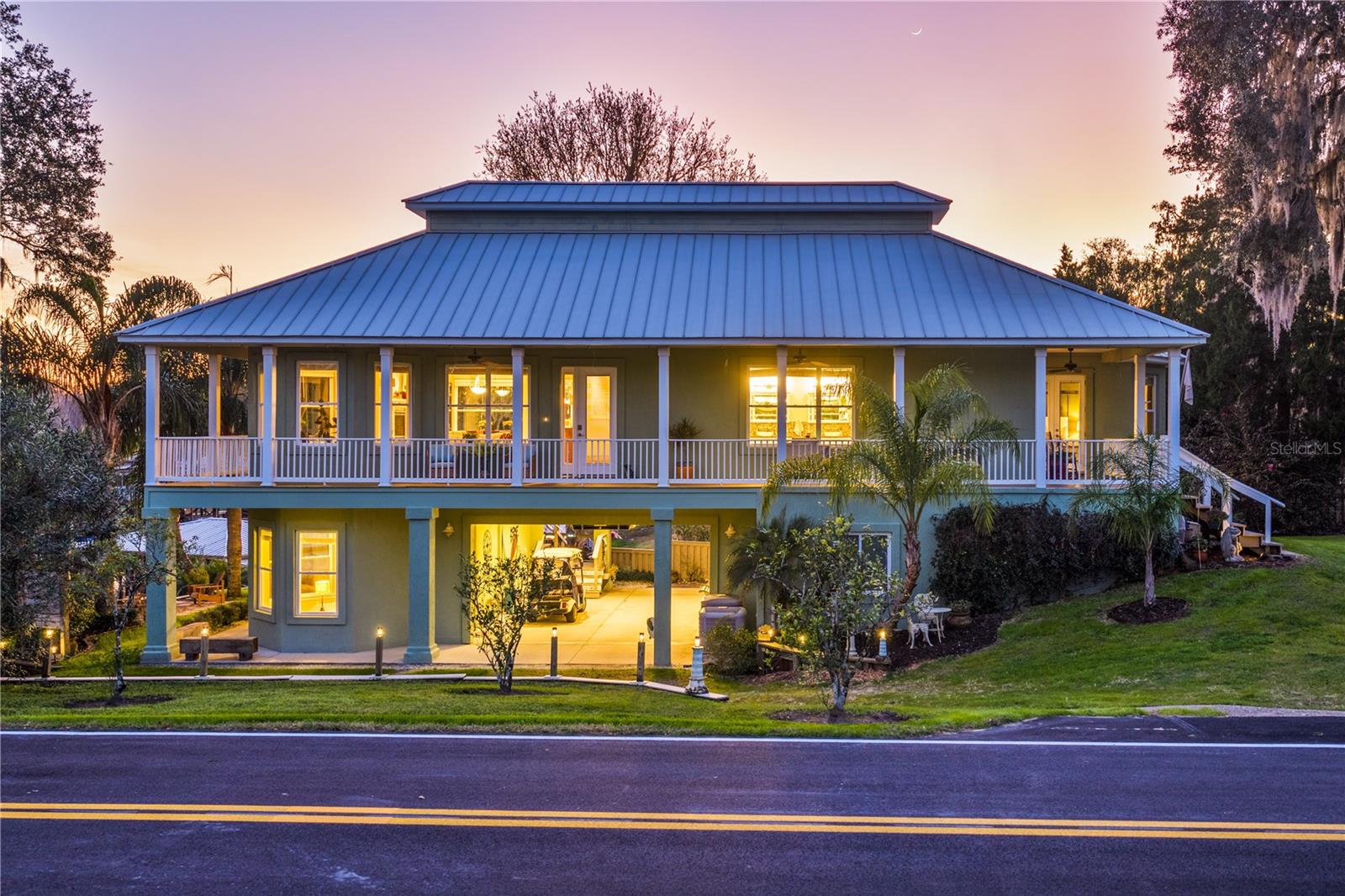 Experience the perfect blend of waterfront luxury & income potential in this unique Key West Inspired luxury custom home. The primary residence boasts 2BD/2BA, & features open-concept living w/ sun-drenched windows, hardwood floors & 10-foot ceilings. A 2-sided see-through gas fireplace anchors the main living space, offering warmth & elegance, a large chef’s dream kitchen w/ plenty of storage, granite countertops, KraftMaid cabinetry, double ovens, soft-close drawers & doors. Finish your day of boating & fishing w/ a therapeutic bath in the oversized jetted tub paired w/ a fireplace. The Primary en-suite features an oversized walk-in shower, heated towel rack, & custom vanities. Please see Features & Benefits sheet under the documents page.Versatile Second Unit: On the lower level, a separate, fully contained & equipped, 1BD/1BA apartment w/ its own luxury kitchen w/ premium cabinetry & quartz countertops, full bathroom & a large bedroom. The private entrance makes this a perfect space for extended family, extra rental income or even a home office. Carefully designed & impeccably constructed, this residence exudes sophistication, strength, & style. 3,006 sqft of living space, plus 536 sqft of unfinished a/c attic, this 3-bedroom, 3-bathroom home showcases ICF (Insulated Concrete Form) construction, steel-reinforced & concrete-filled for unmatched durability, energy efficiency, & peace of mind.Property Highlights:• Solid ICF (Insulated Concrete Form) construction with steel-reinforced, concrete-filled walls• One owner; original blueprints available• Versatile lower-level second unit with 1 bedroom and 1 bathroom• 8-foot solid wood and steel interior doors• ¾-inch rich cherry hardwood flooring• Granite countertops in the main kitchen• Soft-close cabinetry in both kitchens• Tall 8-inch baseboards & custom wood crown molding • Bullnose drywall corners• Abundant natural light • Elevator shaft (currently dual pantries), pre-plumbed & ready for an 8-foot elevator• Climate-controlled hurricane/panic room for safety & secure storage• Climate-controlled attic space (approx. 11' x 40')• Climate-controlled garage/workshop• Boat shed on dock plus large dockside storage shed• Additional plastic garden shedOutdoor living is equally captivating. Enjoy your morning coffee on the wraparound porch w/ water views of spring-fed Lake Saranac, the St. Johns River, & the neighborhood Harbor, while listening to the tranquil sounds of the waterfall. Depart from your private dock,w/ a 12,000-lb elevator boat lift & enjoy endless days of fishing the St. Johns River, hanging out at the sandbars or a day of swimming in the  clear waters of Salt Springs & Silver Glen. The Seller is open to sell the additional waterfront lot across Gibbs Road, offering a rare opportunity to expand your waterfront lifestyle or investment potential. The lot fronts spring-fed Lake Saranac, which flows directly into the St. Johns River.  The parcel measures approximately 154’ x 57’ with approximately 45 feet of frontage on Lake Saranac, making it ideal for a separate residence for in-laws or extended family, a guest cottage, or an additional income-producing home, subject to applicable zoning and permitting. Nestled w/in a desirable, quiet waterfront neighborhood, w/ newly paved roads, this home radiates tranquility and understated luxury, the perfect blend of craftsmanship, comfort. It is a rare opportunity to own a home built for a lifetime.