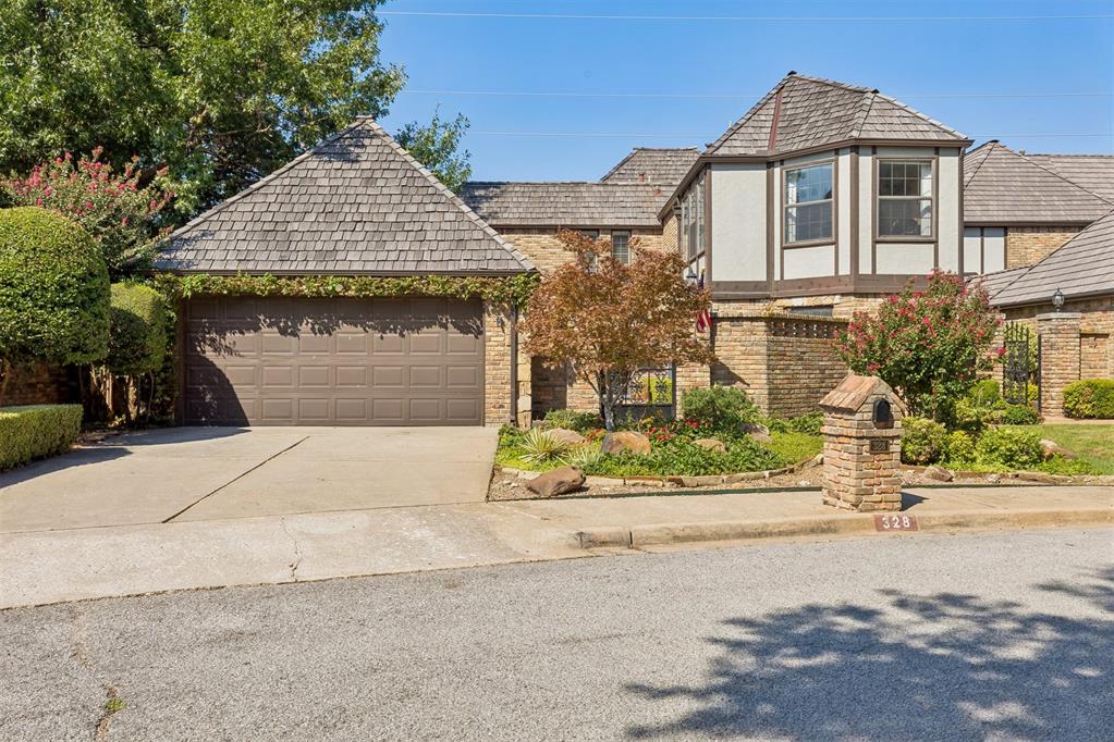 Welcome to this beautiful Brookhaven Square home, a one-owner property built by renowned builder Don Cies, where quality craftsmanship, thoughtful design, and incredible potential come together. From the moment you step inside, you can feel the quality and care that went into creating this exceptional home. The inviting floorplan offers wonderful versatility, with the spacious primary suite conveniently located on the main level. The primary bath features its own laundry area, while a second laundry room is located upstairs for added convenience. Throughout the main living spaces, abundant windows fill the home with beautiful natural light, creating a warm and welcoming atmosphere. Soaring ceilings and a charming brick fireplace add character and elegance to the main living area. The home offers two dining spaces, including a cozy breakfast nook and a generous formal dining room—perfect for everything from casual mornings to memorable gatherings. Upstairs, you’ll find two generously sized bedrooms, along with an impressive home office created from the original balcony. Surrounded by a wall of windows, this bright and inspiring space offers exceptional natural light and could easily serve as a creative studio, study, or additional flex space. A charming upstairs loft provides the perfect spot for a reading nook or quiet retreat. Step outside and discover even more to love. The beautiful courtyard entry creates an inviting first impression, while the spacious deck and pergola provide an ideal setting for outdoor entertaining, relaxing, or enjoying peaceful evenings. The front courtyard offers another wonderful sitting area, complemented by just enough green space for pets, play, or gardening. An in-ground sprinkler system helps keep the grounds lush and beautifully maintained. You do not want to miss this one.