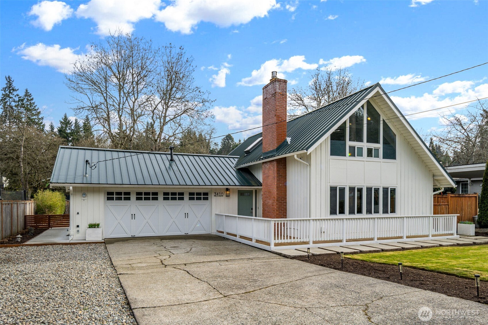 This beautifully finished Mercer Island home delivers an exceptional blend of light, space, and livability. Extensively updated for modern living, this home features two main floor bedrooms and two upstairs bedrooms, with a convenient 3/4 bathroom on each floor. The open-concept kitchen, living, and dining areas create a seamless flow that works equally well for everyday living and entertaining. French doors from one of the main floor bedrooms and sliding doors from the dining area extends the living space outdoors to a thoughtfully designed private and fully fenced backyard, level lawn, trellised patio, fire pit, and hot tub, ideal for gatherings or quiet evenings at home.    The primary suite upstairs features soaring vaulted ceilings that add volume and character, while natural light fills the home throughout the day. Every space feels intentional, balanced, and comfortable, with a layout that truly lives larger than the square footage suggests.    The front yard is beautifully manicured and complemented by a wraparound deck that enhances both curb appeal and usability.  Located just steps away from Mercerdale Park with playground and tree lined walking trails, a short walk to bus stops, and just minutes from downtown Mercer Island, with access to top-tier schools, this home offers a rare combination of privacy, style, and location in one of the island’s most desirable settings. Offers reviewed Thursday February 4th at 2pm. Inspection available.