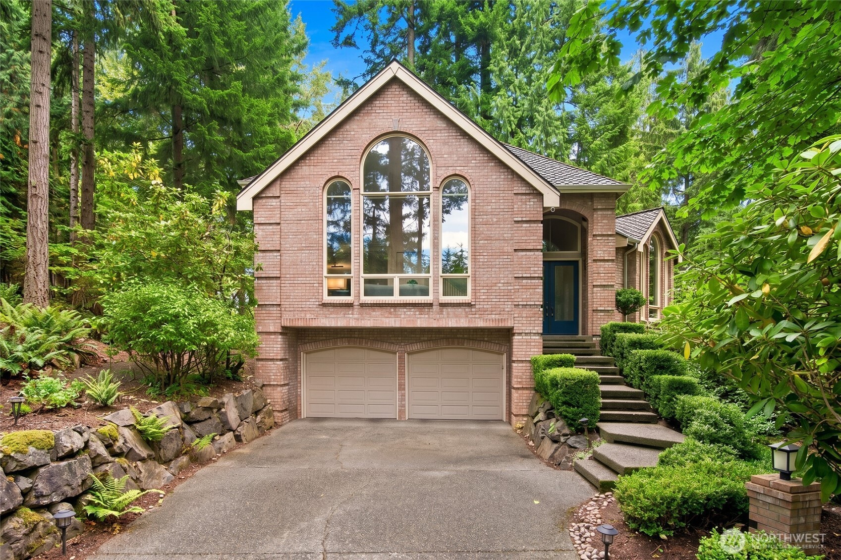 Welcome to you own private sanctuary! Nestled on a 3/4 acre lot in Lakemont’s coveted Vuemont Meadows neighborhood this 3,870-sf/4-Bed/4-Bath-room blends timeless quality with convenience & location. The highly rated Issaquah School District—boasts top 10-ratings on ALL assigned schools* & just a short walk to Cougar Ridge Elementary. A long, private driveway surrounded by natural foliage leads to this stunning classic brick home. With vaulted ceilings, skylights & expansive windows this spacious light-filled home has all the right spaces—elegant living & dining rooms, comfy fireside family room & convenient main floor office set away from the rest of the shared spaces. Chef’s kitchen has slab counters, pantry & NEW SS gas stove+ a study nook off the informal dining area. 4-Beds, including a private lower-level bed with adjacent 3/4 bath. Upstairs, X-Large Primary suite adorned w/timeless finishes offer a gas FP, private deck & a modern 5-piece bath w/WIC. 2 more large bedrooms & full bath rounds off the top floor. NEW furnace & water heater. Highest quality Presidential TL comp roof . Enjoy being surrounded by nature on the large Azek deck w/stub for a gas BBQ. A large lawn area allows pets the freedom to run & play + plenty of spaces to explore throughout the wooded property. The 3 car tandem garage offers a workshop, loads of storage & electric charger. Added concrete slab for extra parking/easy turn around. Quick access to I-90 & walk to Lakemont shops & parks.