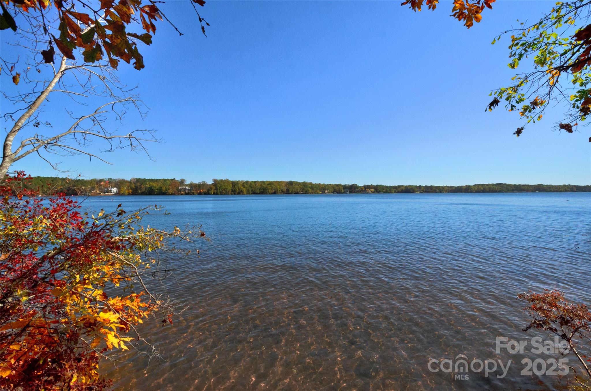 The Waterfront Main Channel Home Site that you have been waiting for. Frame the picturesque panoramic view, with the home of your dreams. Gently sloping with a majority of hard woods, street access to public water and sewer and underground utilities. Situated in the prestigious private community of Edgewater on Lake Tillery, featuring a clubhouse, outdoor olympic size pool, waterfront pavilion with sandy beach, community boat ramp, and boat/RV storage. Proposed 1200 sq ft boat house with Duke Energy approval.
The property lines have been marked. 
A Sustaining Value.  

Showings begin Friday 11/7/2025.