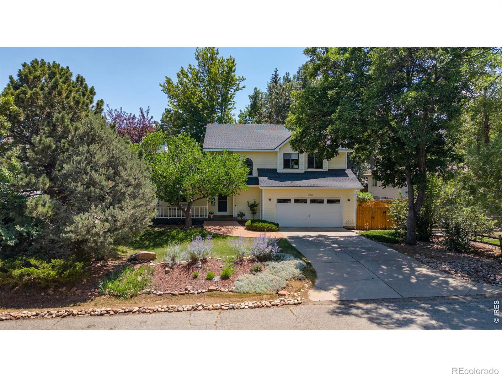 OPEN SUNDAY 1-3 PM! Nestled on a quiet North Boulder street in one of Boulder's most sought-after neighborhoods, this move-in ready home offers exceptional value just moments from Lucky's Market, local cafes and restaurants, Wonderland Lake, and miles of scenic trails. A welcoming covered front porch leads into a beautifully updated interior featuring modern finishes & a NEW FURNACE & HOT WATER HEATER. The remodeled kitchen showcases custom cabinetry, quartz countertops with a waterfall edge and a designer backsplash. Vaulted ceilings, abundant natural light, wood floors, updated powder bath, and cozy fireplaces enhance the open living and dining spaces. French doors open to a private, fenced backyard with mature landscaping, a pergola, and flagstone patio-perfect for relaxing or entertaining. Upstairs, you'll find 3 bedrooms, an updated full bath, and spacious primary suite with walk-in closet and remodeled en-suite bath featuring a soaking tub & separate shower. The versatile lower level has its own exterior entrance and includes a 4th bedroom, full bath, bonus/rec room, office or 5th bedroom, 2nd full kitchen, and additional laundry and is ideal for guests, multi-generational living, a home office, or FANTASTIC INCOME-PRODUCING POTENTIAL. Love Where You Live!