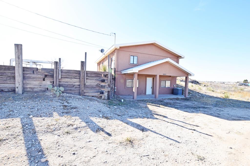 Unique 2 story home on 1 acre. Large yard to build a shop or create your own oasis.  Really cute home surrounded by large hill. Your sure to fall in love and this home is ready for a new owner so call a realtor and make this one yours! 4 bedrooms and 2 1,2 baths!