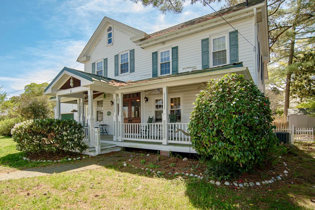 Historic home for sale in Onancock, VA, completely rebuilt in 2010, blending circa-1790 charm with modern construction. Currently configured as a 4 bedroom, 3 bath with over 2,100 sq ft, this Eastern Shore property offers spacious living and timeless character. Centrally located in downtown Onancock, enjoy walkability to the waterfront, marina, restaurants, shops, and art galleries. Convenient to Wallops Island, Chincoteague Island, and Cape Charles. Property is currently utilized as short-term rental, buyer to perform due diligence. Ideal as a primary residence, vacation home, or investment opportunity. Short boat ride to the Chesapeake Bay.