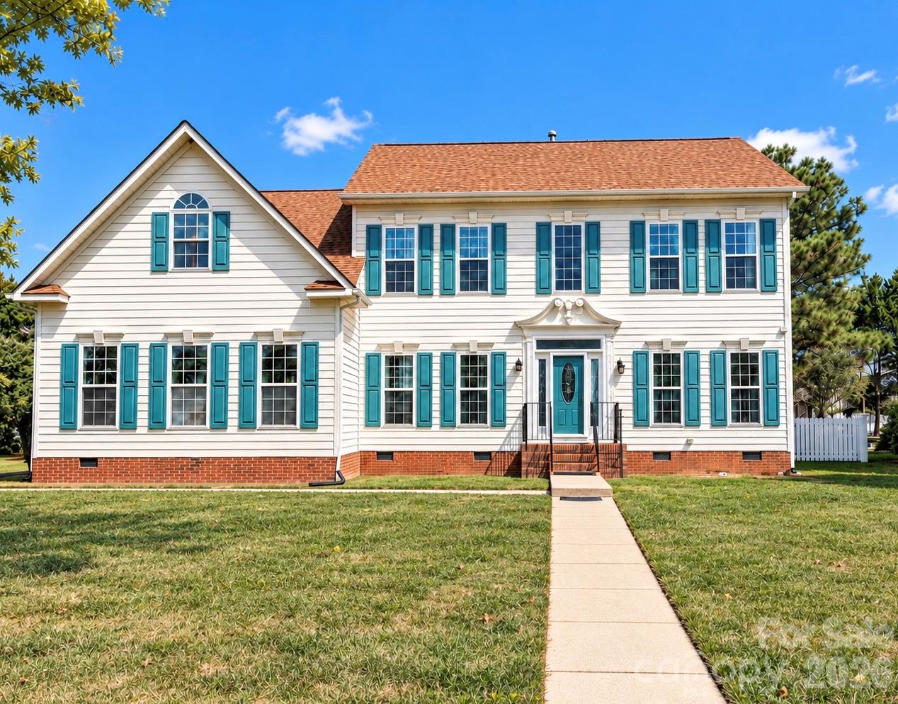 Welcome to 6500 Courtland, where spacious living, architectural details, and your very own backyard retreat come together in Indian Trail's beloved Lake Park community! From the moment you enter, the impressive two-story foyer sets the tone with soaring ceilings and a striking catwalk overlooking the great room. Fresh interior paint throughout brings a renewed, inviting feel to this 5-bedroom, 3-full-bath home, offering plenty of space to gather, entertain, and spread out. The kitchen, at the heart of the home, combines granite countertops, real wood cabinetry, and a charming breakfast area ideal for morning coffee, casual meals, and catching up at the end of the day. The spacious great room is made even more memorable by its dramatic ceiling height and open views from above. One of the most versatile features is the generously sized main-level bedroom and full bathroom. Need a guest suite, private office, den, media room, playroom, or recreation space? This flexible layout gives you options as your needs evolve. Upstairs, the generous primary suite offers vaulted ceilings and a beautiful en-suite bathroom, while the additional bedrooms feature ample closet space. Then there's the backyard! Step outside to a fenced, private oasis featuring your own in-ground saltwater pool. Picture afternoons by the water, weekend gatherings, and evenings relaxing right at home. And when you're ready to venture beyond your backyard, Lake Park adds even more ways to enjoy the outdoors: community swimming pools, a lake, walking trails, tennis courts, playgrounds, and recreation areas. With fresh paint, flexible living spaces, a show-stopping entry, your own saltwater pool, and the amenities of an established neighborhood, 6500 Courtland brings together comfort, character, and lifestyle. Come see how easily you can picture yourself here!