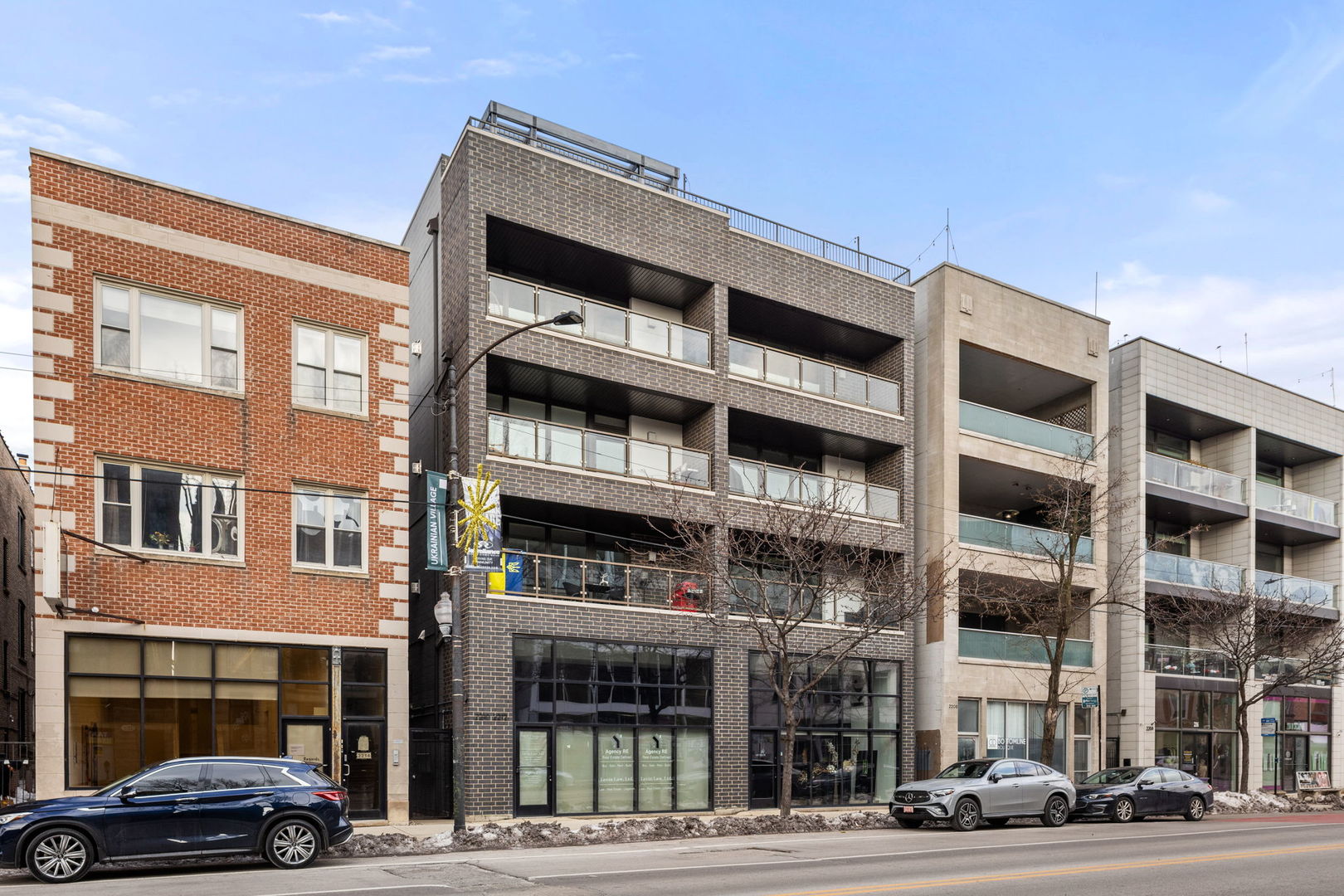 Live the Luxury Lifestyle in Ukrainian Village. Step into this sophisticated elevator-access condo in one of Chicago's most sought-after neighborhoods. This 3-bedroom, 2-bath residence features upscale modern finishes, including Italian Co-PAT cabinetry, quartz countertops, a marble backsplash, and premium Thermador appliances. Enjoy hardwood floors throughout, a sleek gas fireplace, and thoughtfully selected designer lighting and tile.  The professional-grade eat-in chef's kitchen offers a spacious island, oversized breakfast bar, and ample storage, opening seamlessly into an expansive living area with a true separate dining space-perfect for both everyday living and entertaining.  Retreat to the spa-inspired primary suite, complete with heated floors, a walk-in shower, and a generous walk-in closet.  Outdoor living is exceptional, with both a private front balcony and exclusive roof deck space. A RARE, FULLY-PRIVATE, 2 CAR GARAGE is included in the price. Located just steps from an incredible selection of restaurants, bars, shops, parks, and public transportation-including nearby Smith Park-this home delivers the best of city living in a vibrant neighborhood setting. Don't miss this opportunity to own a truly exceptional home in Ukrainian Village.