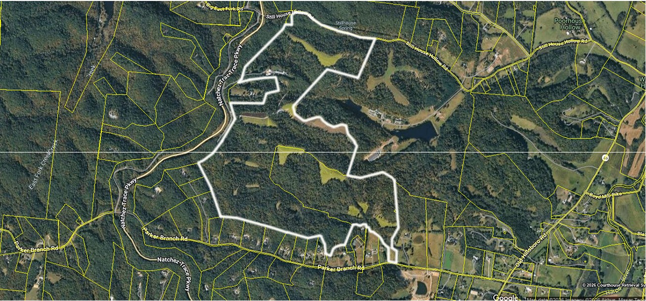 The strategic acquisition of 430 acres over the past two decades, offers an abundance of what makes west Williamson County so desirable. A rare and highly valuable component of this 430 acre property is the existence of nine separately platted and permitted sites for estate residences (five-eight bedrooms approved by Wm. Cty.), thoughtfully positioned across the farm to maximize privacy and views.  The topography, highlighted by five distinct ridges offers spectacular long-range ridge and valley views and hilltop pastures, wooded hillsides of mature hardwood timber laced with spring fed creeks, hidden hollows and miles of trails for exploring make Still House Hollow Farms unique. In addition, it creates the ideal habitat for healthy populations of whitetail deer, wild turkey and dove.The location off Old Hillsboro Road, between Hwy 96 and the Village of Leiper's Fork is superb.  With road frontage and gated access from Parker Branch, Still House Hollow and Poor House Hollow, and bordering the Natchez Trace Parkway, the property offers convenience while maintaining remarkable seclusion. Approx. 50 min. to downtown Nashville, 15 min. to Franklin and 7 min. to the Village of Leiper's Fork. Whether your looking for: the outdoorsman's hunting and recreational property, a luxurious residence to complement the equestrian amenities, a secluded, yet easily accessible retreat and sanctuary, a venue for hosting family and friends, or a private, self-sufficient, off-grid experience, then Still House Hollow Farm  should be considered.      A collection of improvements surround the hand-crafted, award winning Anderson Design Studio's Lodge.  Adjoining the lodge is an entertaining pavilion and outdoor cooking venue, fire pit gathering spot, and bathhouse.  An eight stall horse barn with hay loft storage, an independent cabin, gym, bunk houses, kennels, car and wood shop facilities, garages, chicken barn and equipment storage barns. Greenbelt.  No HOA