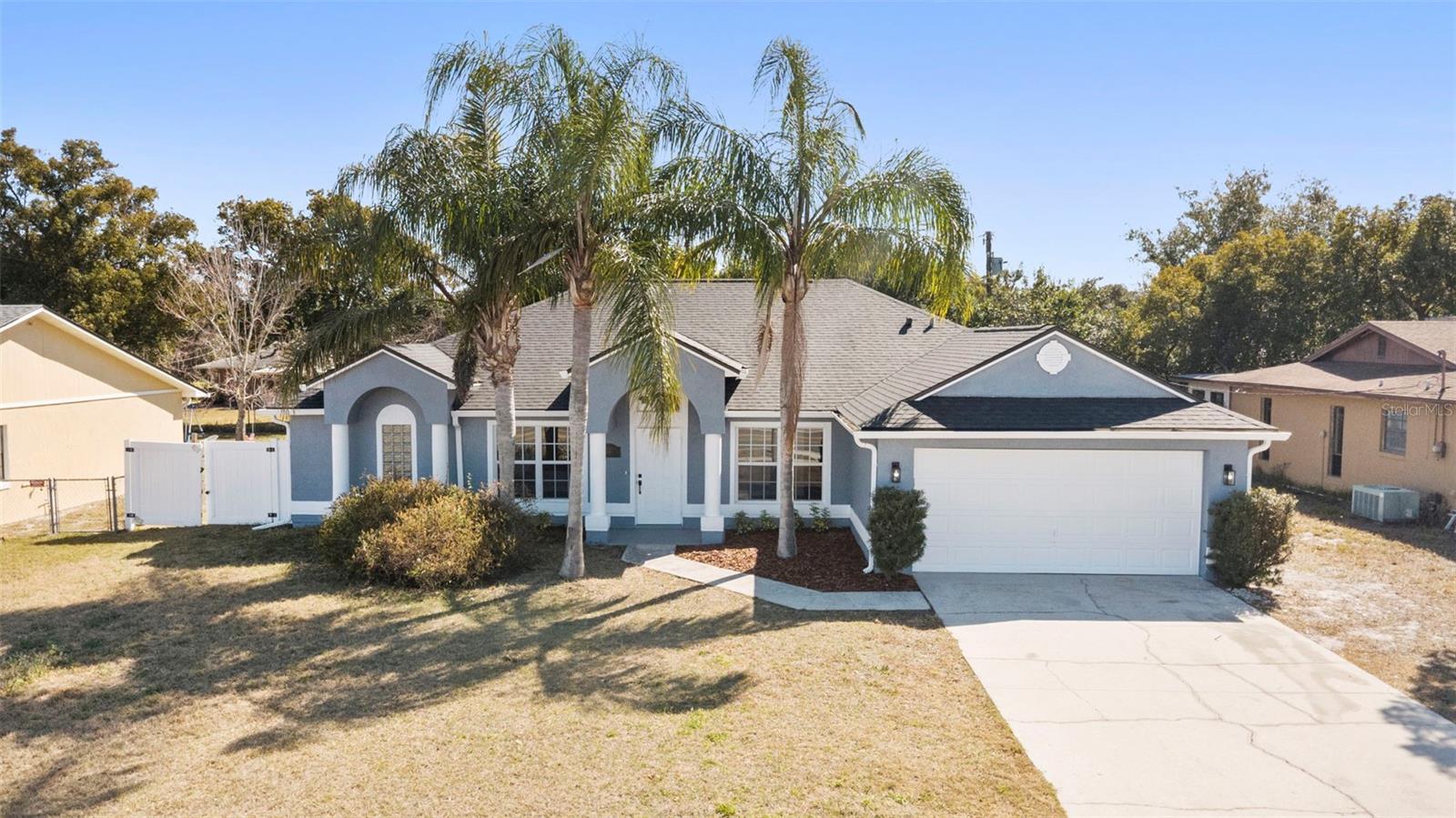 One or more photo(s) has been virtually staged. Bright and inviting, this fenced 4 bedroom, 2 bath home offers 2,042 sqft of living space with a flexible den that can serve as a home office, play area or hobby room. The kitchen and bathrooms have been updated with new countertops, the bedroom floors have been refreshed and the home has received fresh interior and exterior paint for a clean modern look. Enjoy peace of mind with a new roof and HVAC both installed in 2025. Step outside to a fully fenced yard offering plenty of space for entertaining, pets or weekend gatherings. With its spacious layout and move in ready condition, this home is ideal for both everyday living and hosting family and friends. Conveniently located in Deltona with easy access to I-4, commuting is simple and Orlando is just a short drive away. Plus, you're approximately 30 minutes to Daytona Beach, making spontaneous beach days an easy reality. Nearby shopping, dining, parks and schools add to the overall convenience and lifestyle appeal.