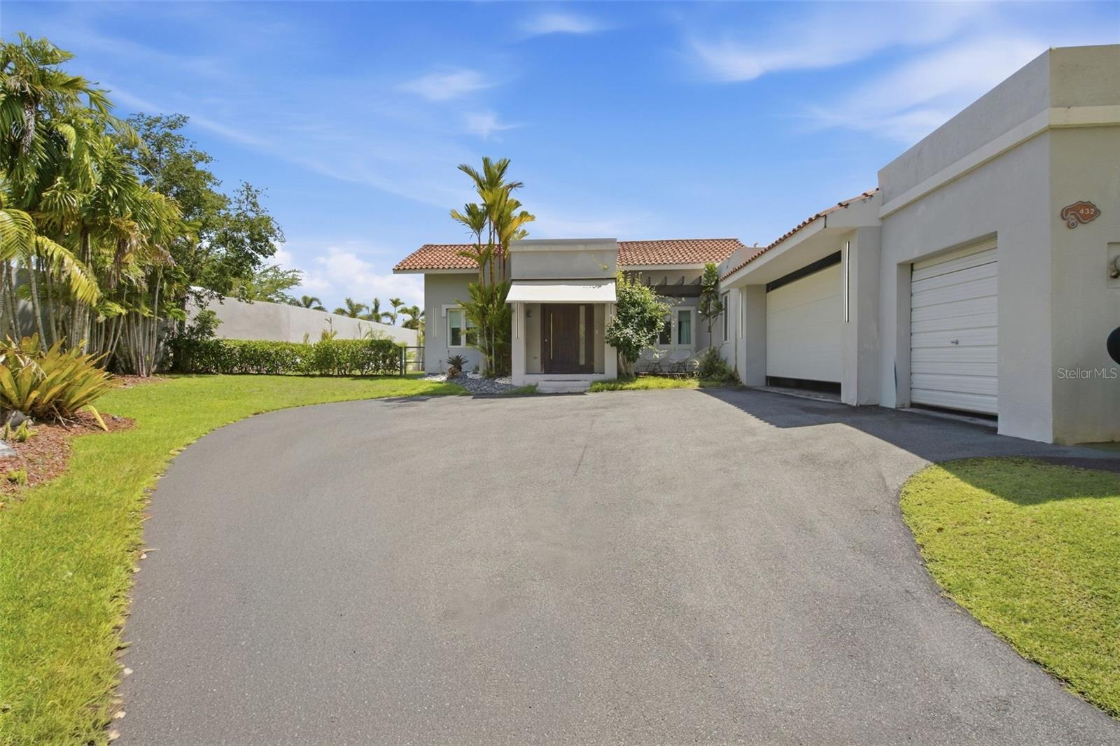Beautifully renovated and thoughtfully expanded, 432 Dorado Beach East offers the familiar appeal of the Golfer model, with more room to bring everyone together and comfortable spaces to make your own. Beyond the original three-bedroom layout, an added fourth bedroom with a full bathroom makes room for visiting grandparents to stay comfortably, a nanny to have a dedicated space, or a home office without sacrificing the rooms where everyone gathers.The expanded family room brings a more open feel to the home with space for a second lounge, a playroom, or a comfortable place to unwind at the end of the day.The kitchen, renovated in 2026, features a Sub-Zero refrigerator and freezer alongside a Wolf gas stove, oven, and microwave. Remodeled bathrooms, updated flooring, and fresh paint completed in 2025 carry that refreshed feel throughout the interiors.The roof was also redone in 2025, and a 2026 exterior refresh included pressure washing and landscaping. An Olympian diesel generator and a 400-gallon cistern provide backup power and water. The home is offered furnished, with select artwork and accessories subject to negotiation.With the major interior renovations already done, you can settle in and enjoy the home while bringing your own vision to the backyard. Whether you imagine gathering outdoors or creating a quiet retreat, there is an opportunity to make this part of the home distinctly yours.The corner cul-de-sac lot adds to the appeal, with limited passing traffic and a quieter setting for outdoor play. Its location near Dorado Beach East’s south gate brings everyday convenience, making school runs to TASIS, the hospital, and coming and going that much easier. More room inside, opportunities outside, and a convenient location come together in a home ready for its next chapter.