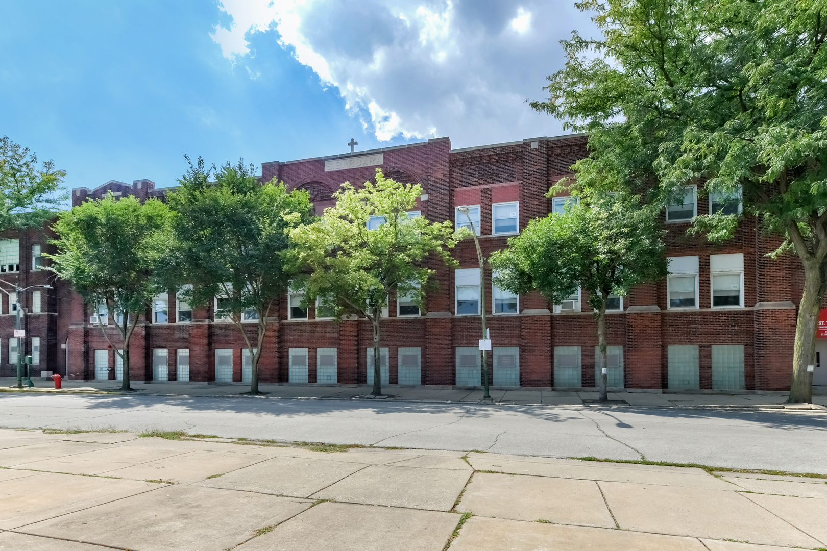 Fantastic opportunity for institutional user or developer. Solid, brick, rectangular, vintage school plus excess land. This offering includes 9 lots (lots 9, 10, 11, 35, 38, 41,44, 47, 50) plus the parking lot to the immediate south of those lots (paved area between the one-story mobile classroom and the school building), and the portion of the school building including lots 5, 6, 7 and 8, which is the gymnasium. The building and gymnasium are in good general condition. Great located on the developing north end of Bridgeport in the vicinity of Archer Ave & Halsted St. Low density area and zoning RS3 with RT4 adjacent. Easy access to L (about two blocks) and expressway on/off. This is the entire Quinn side of St Barbara school and gym plus lots available.