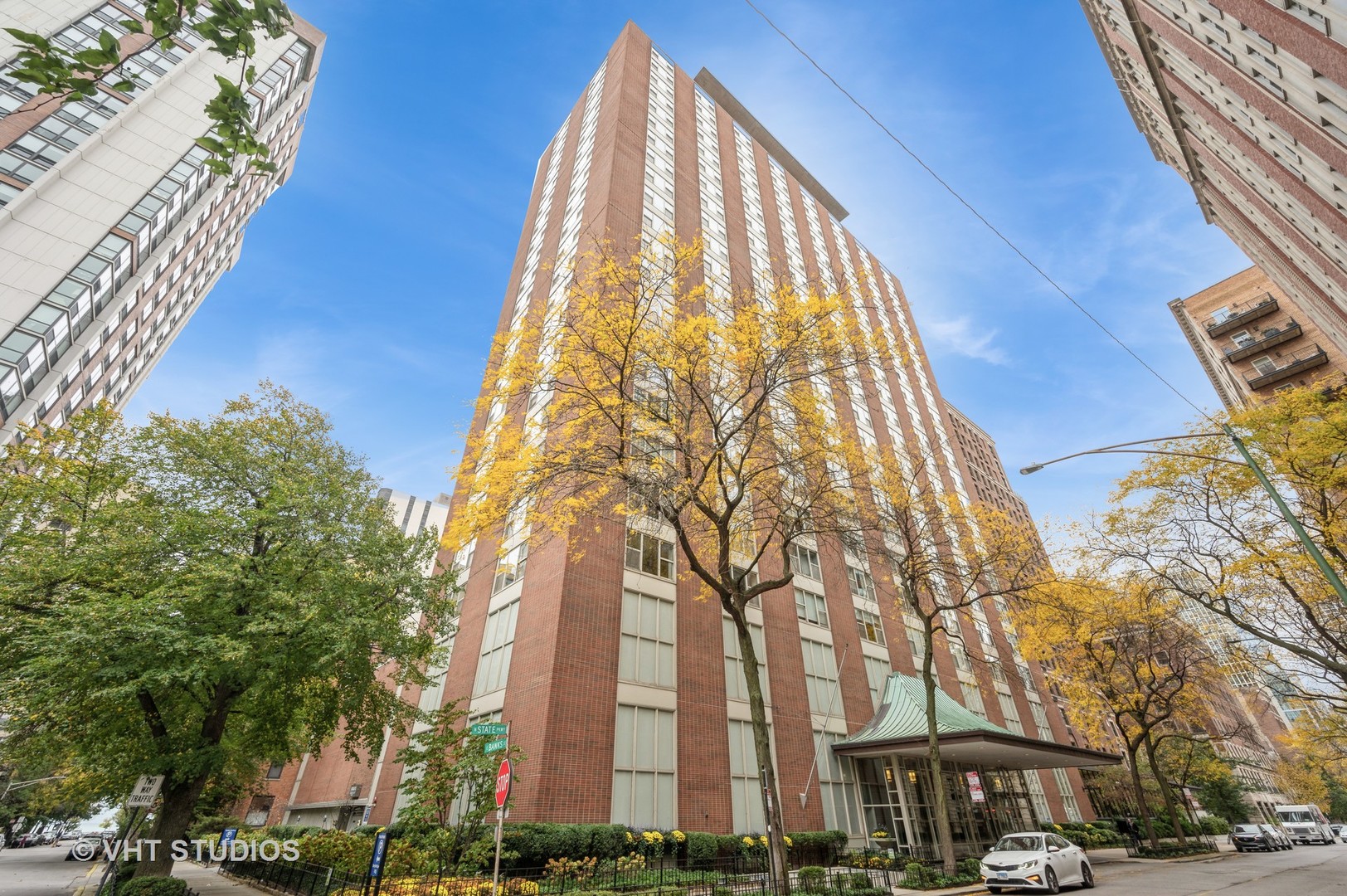This stunning Gold Coast 2bed/2bath southwest corner unit has been renovated to perfection! Enjoy the desirable open concept floor plan that is flooded with natural light. The spacious 1650sf home features wide-plank oak floors throughout. The upgraded, gourmet kitchen has custom cabinetry, quartz countertops, premium stainless steel Bosch appliances, stone backsplash, a breakfast bar and dedicated space for dining. The extra large primary bedroom boasts a walk-in closet and an en-suite remodeled bathroom. Spacious, second bedroom with oversized closets. A dedicated closet for in-unit laundry with sink. Located on a lovely, tree-lined street in a full amenity, boutique high-rise building, you will also have access to a 24hr doorperson, receiving room, bike room, newer elevators, storage, plus a rooftop with a sundeck, pool and stunning city/lake views. Indoor valet parking available for rent through building, as well as an assigned storage unit. Located just steps from all the Gold Coast has to offer: Chicago's lakefront, parks, shopping, dining, theaters, public transportation, and more!