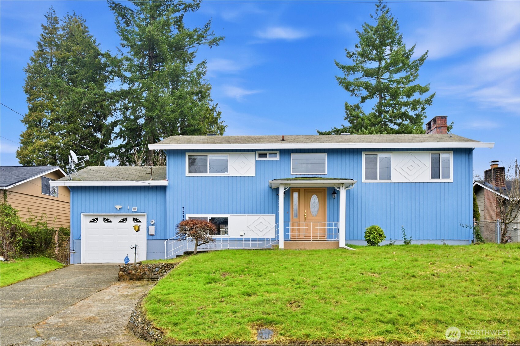 Well-maintained 5-bedroom home featuring 2 full bathrooms in a highly desirable location. The upper floor offers hardwood flooring, a remodeled bathroom, and a newly updated kitchen. Enjoy cozy fireplaces in both the living room and family room, along with energy-efficient double-pane windows.    Conveniently located in the Kent School District with easy access to major freeways, downtown Kent, and WinCo. Kent Laboratory Academy, a highly regarded choice school, is just 6 minutes away. The home also backs to elementary school grounds, providing added openness and community appeal.    The spacious private backyard features three mature cherry trees, offering beautiful seasonal blooms, shade, and outdoor enjoyment. Located in a friendly residential neighborhood, this home is perfect for comfortable everyday living. A must see!