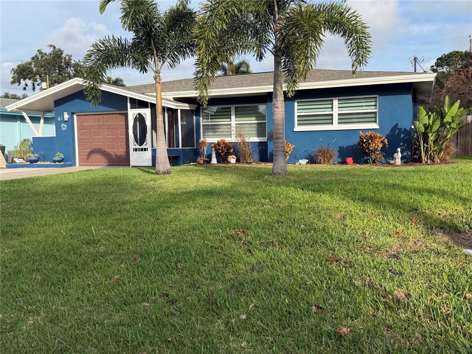 Welcome to your private paradise in the heart of Dunedin.  This exquisitely updated 3-bedroom, 2 bath residence with a 1-car garage showcases refined finishes and thoughtful design throughout.  The resort-style pool and serene outdoor space create an ideal setting for both intimate relaxation and endless entertaining. A new roof installed in 2025 conveys with warranty to buyer, and brand-new AC system will be installed prior to closing, offering peace of mind for years to come.  Beautifully refinished terrazzo floors add timeless elegance, fully rescreened and refinished birdcage.  Bring your golf cart and enjoy effortless access to downtown Dunedin's renowned breweries, restaurants, and waterfront lifestyle, as well as Honeymoon Island and Caladesi Island.  Located in a no flood zone. A rare opportunity to enjoy elevated Florida living in a premier location.