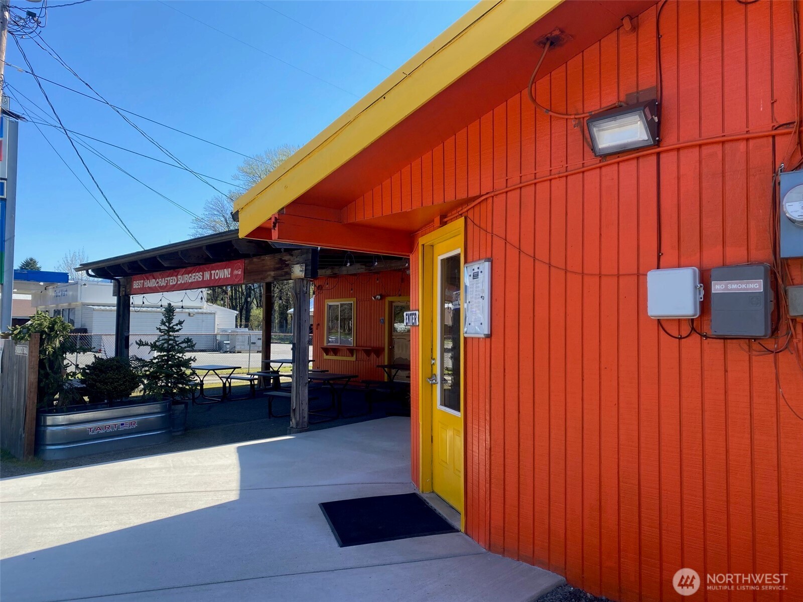 High-Return Investment Opportunity in the heart of Packwood, WA–Restaurant + Real Estate Package! 1,833 SF restaurant +588 SF unfinished apartment on a 0.20-acre lot, 11 parking spots, covered outside dining area, additional space and entrance for another business, lots of storage and potential for STR or apartment onsite with separate entrance and full bath. 15 years of 4-Star+ reviews! Includes real estate, fixtures, furniture, inventory and assets.  Own a thriving, turn-key burger restaurant with real estate at the gateway to Mt. Rainier National Park and White Pass Ski area! Owners are retiring, willing to train/assist new owner(s), not a franchise resale opportunity. Do not disturb the business, don't walk in and talk about the sale!