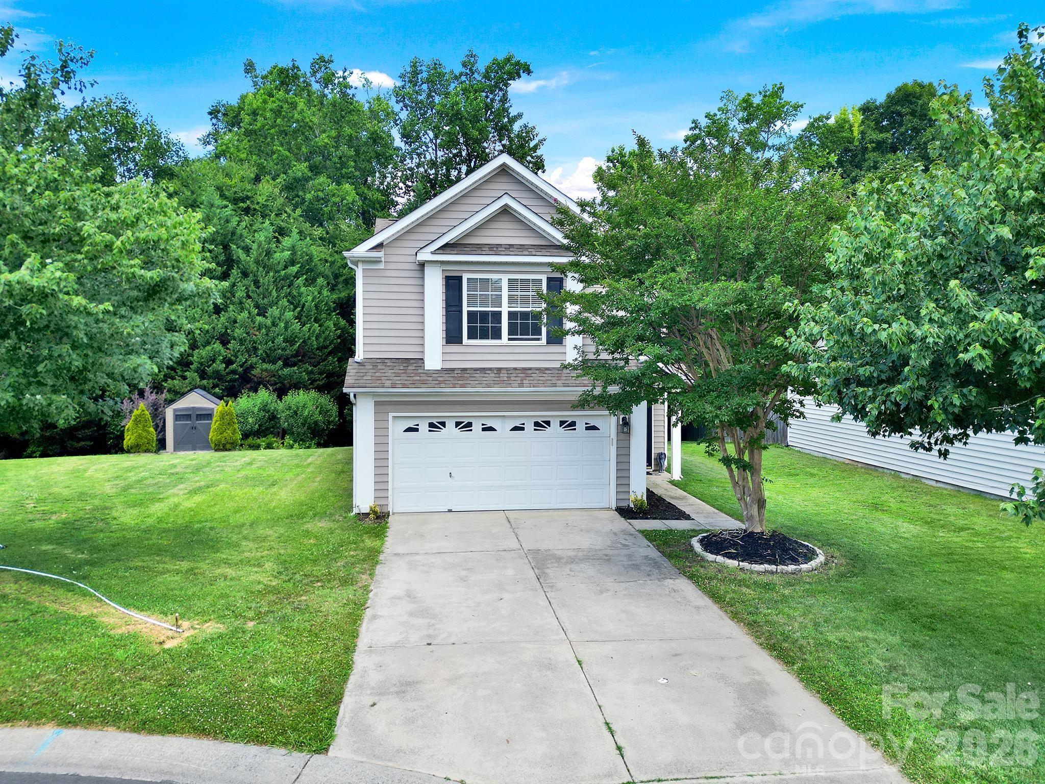 Discover this charming home, perfectly situated on a private wooded cul-de-sac lot. Designed for both comfort and function, the open-concept floor plan is flooded with natural light and features the kitchen and living room as the heart of the home. Updated kitchen features ample cabinetry and newer quartz countertops. Primary bedroom is on the upper level with it's own ensuite bath and large closet with custom built ins. Also upstairs, you'll find 2 additional bedrooms as well as the laundry room. Step outside to enjoy your private backyard ideal for entertaining, relaxing, or simply enjoying the peaceful surroundings. Newer HVAC unit replaced in the last year. Located just minutes from shopping, dining, & top-rated schools, this home offers the perfect blend of it all.