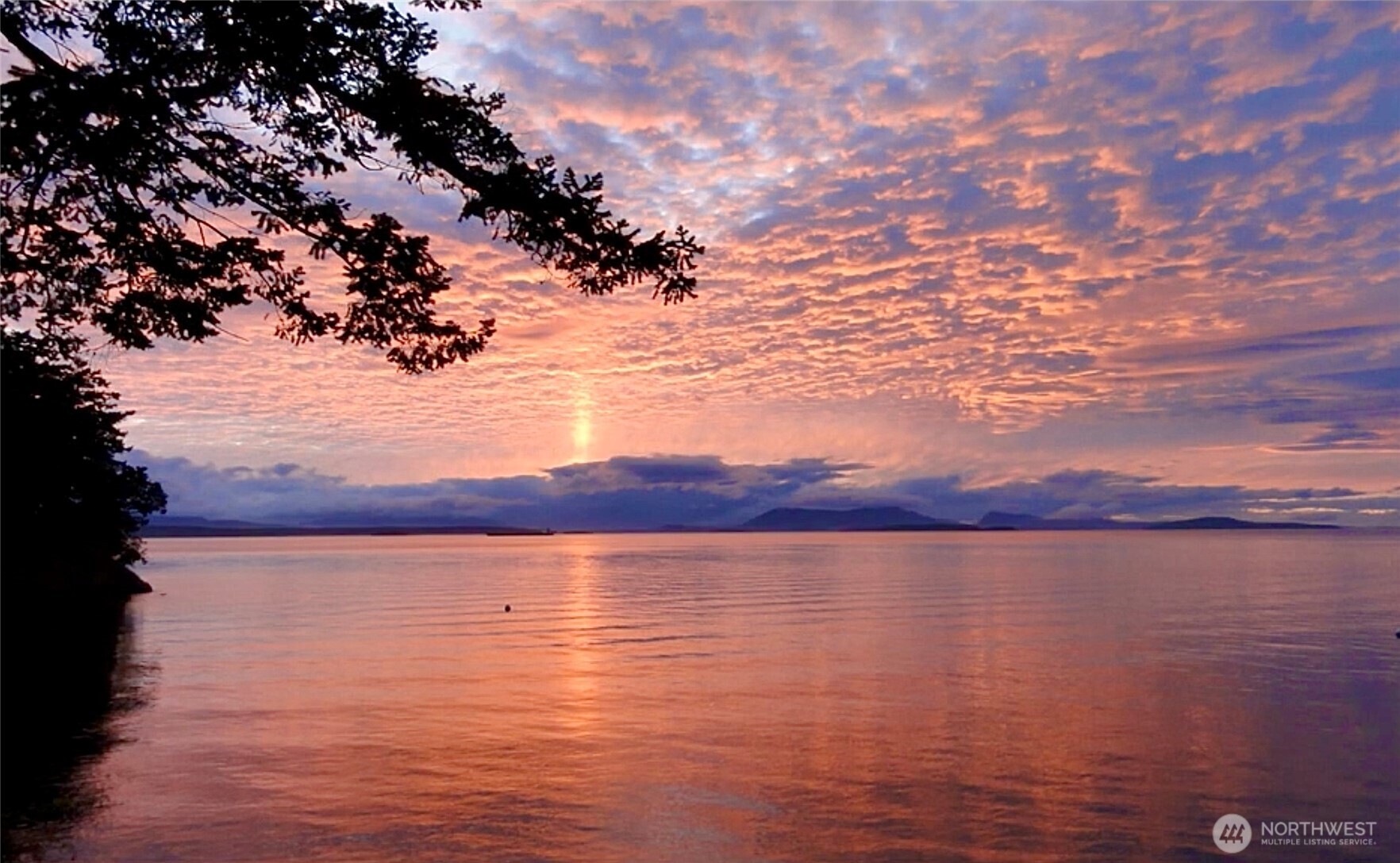Nestled on nearly 2 acres on Big Henry Island’s west side, this Northwest Contemporary waterfront estate offers sweeping views of the Salish Sea and Canadian Gulf Islands. Accessible by private boat or seaplane, and just minutes from Roche Harbor, this Alan Liddle–designed home blends modern elegance with rustic charm. Vaulted, wood-beamed ceilings frame stunning island vistas. Enjoy 200± feet of private waterfront with a buoy and a 30' boat slip. Separate guest quarters include a full kitchen and bunk room. Experience the ultimate Northwest island lifestyle—serene, secluded, and perfect for fishing, beachcombing, and coastal adventure.