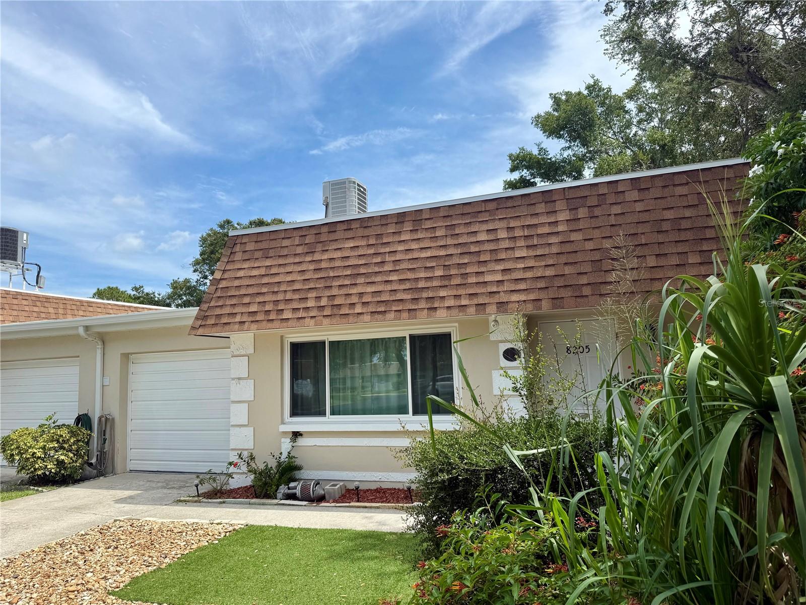 Vendome Village over 55+ Community - Don’t settle for the rest- Come see the Best!
Beautifully updated, move-in ready Villa,  perfect for maintenance-free living. Softly used unit, as owners live out of state. Many updates: Newer panel, heater, AC, appliances, flooring, baths, 2025 new roof. New hurricane impact windows 2023, no prior flooding or hurricane damage. Tastefully redone, plus tons of closet space, including a 3 door bedroom closet, a walk-in closet, a linen closet, plus a coat closet at entry, and your own garage.
This end unit features an attached garage and offers a stunning view of the greenway and a neighboring lake, providing ample privacy and no neighbor-sharing walls. Imagine stepping out and being greeted by serenity. Whether you’re seeking a second sunny home or your primary residence, this quaint villa holds everything you need. Conveniently located, Paradise awaits you! Beaches, Dining, Shopping, SAM’s Club, and the Tampa Airport within distance. 
Community features club house, pool, shuffle board;  maintenance fees include new 2025 roof, water, sewer, trash, internet, cable, plus exterior maintenance, management, insurance, and much more…