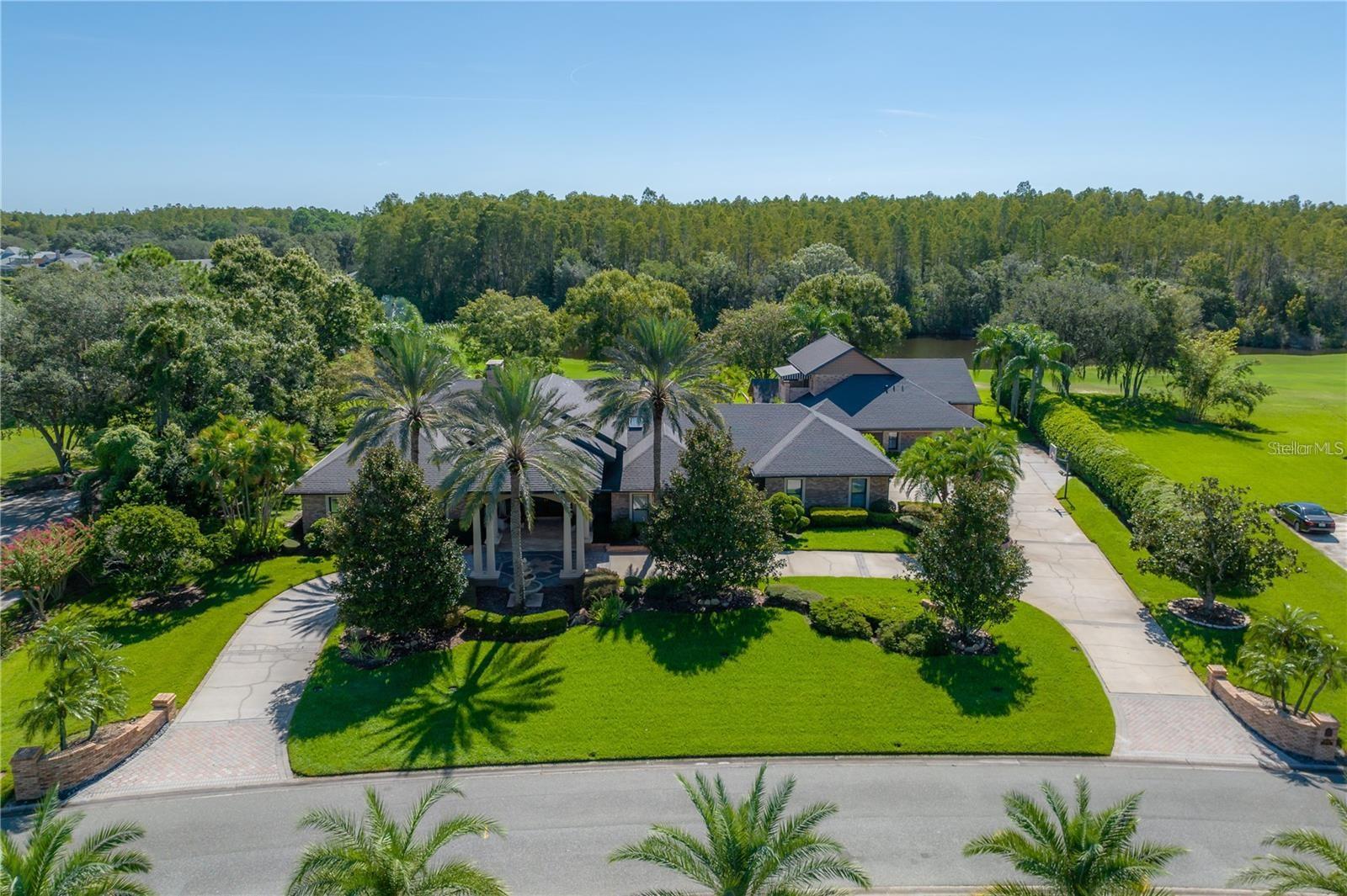 Welcome to an extraordinary golf-course estate in the impressive, 24-hour guard-gated community of Cheval Golf & Country Club—the epitome of Tampa luxury living. This meticulously updated property features a 3-bedroom, 3.5-bath main residence paired with a beautifullyLocated within the guard-gated community of Cheval, this private golf-course estate sits directly on the 10th hole of the club’s newly re-imagined private course—just minutes from Tampa International Airport with effortless access via the Veterans Expressway.Set on an extra-wide homesite, 18707 Pepper Pike offers a rare two-residence layout designed for both elegant everyday living and exceptional entertaining. With a water feature directly behind the home and manicured greens stretching toward the clubhouse in the distance, the setting delivers privacy, beauty, and a true sense of retreat.The primary residence is a thoughtfully designed one-story home featuring three bedrooms and three-and-a-half baths, anchored by expansive living and entertaining spaces. A bonus loft above the main gathering area offers flexibility as a home office, media space, or creative retreat—intentionally positioned to overlook the heart of the home without interrupting flow.The layout is intelligently divided:Private sleeping quarters on one sideCentral living spaces including formal living and dining, breakfast area, and kitchenHighly functional bonus areas including laundry and a dedicated pool bath on the opposite sideThe main home is complemented by a finished garage with built-in storage, fresh epoxy flooring, updated lighting, and ample room for multiple large vehicles and a professional tool or hobby station. A horseshoe-shaped driveway with porte-cochère provides additional parking and easy guest access, set away from the main traffic flow.What truly sets this property apart is the fully separate secondary residence—a private two-bedroom, one-bath casita with its own full kitchen and interior living space, accessible without passing through the main home. This space is ideal for extended family, guests, multigenerational living, private work-from-home use, or hosting events while preserving privacy in the main residence.Whether used for seasonal gatherings, game nights, sports viewing, overnight guests, or long-term flexibility, this dual-residence design is exceptionally rare within Cheval and offers unmatched versatility.Pepper Pike delivers a lifestyle as flexible as it is refined—private, functional, and beautifully positioned within one of Tampa Bay’s most desirable gated golf communities.Schedule your private showing to experience it firsthand.